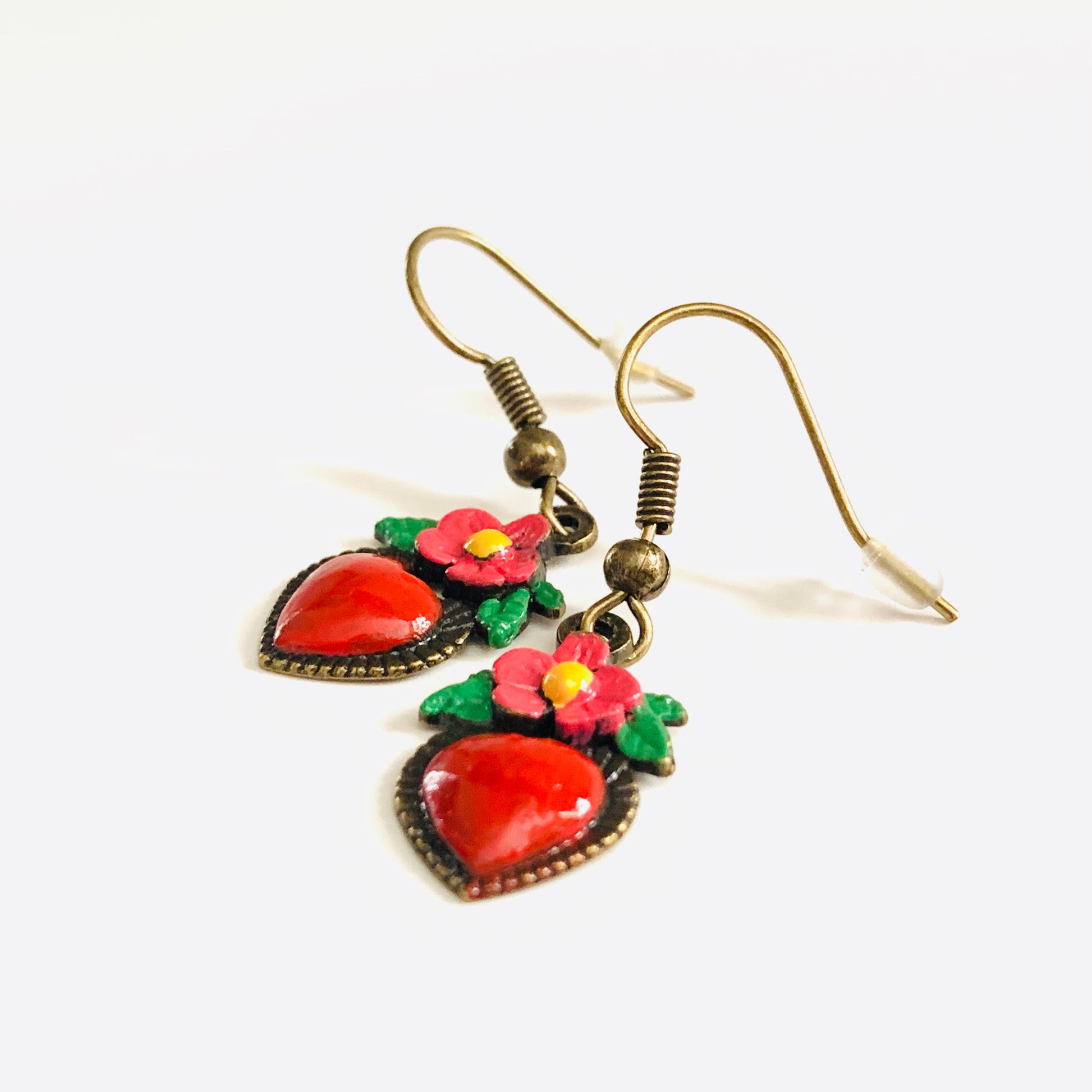Bronze hand painted heart and flower earrings. Red, pink, green, and yellow paint. Mexican earrings. Mexican jewelry for fridamaniacs, fridalovers, fridamania. Frida Kahlo. Mother's Day gift.
