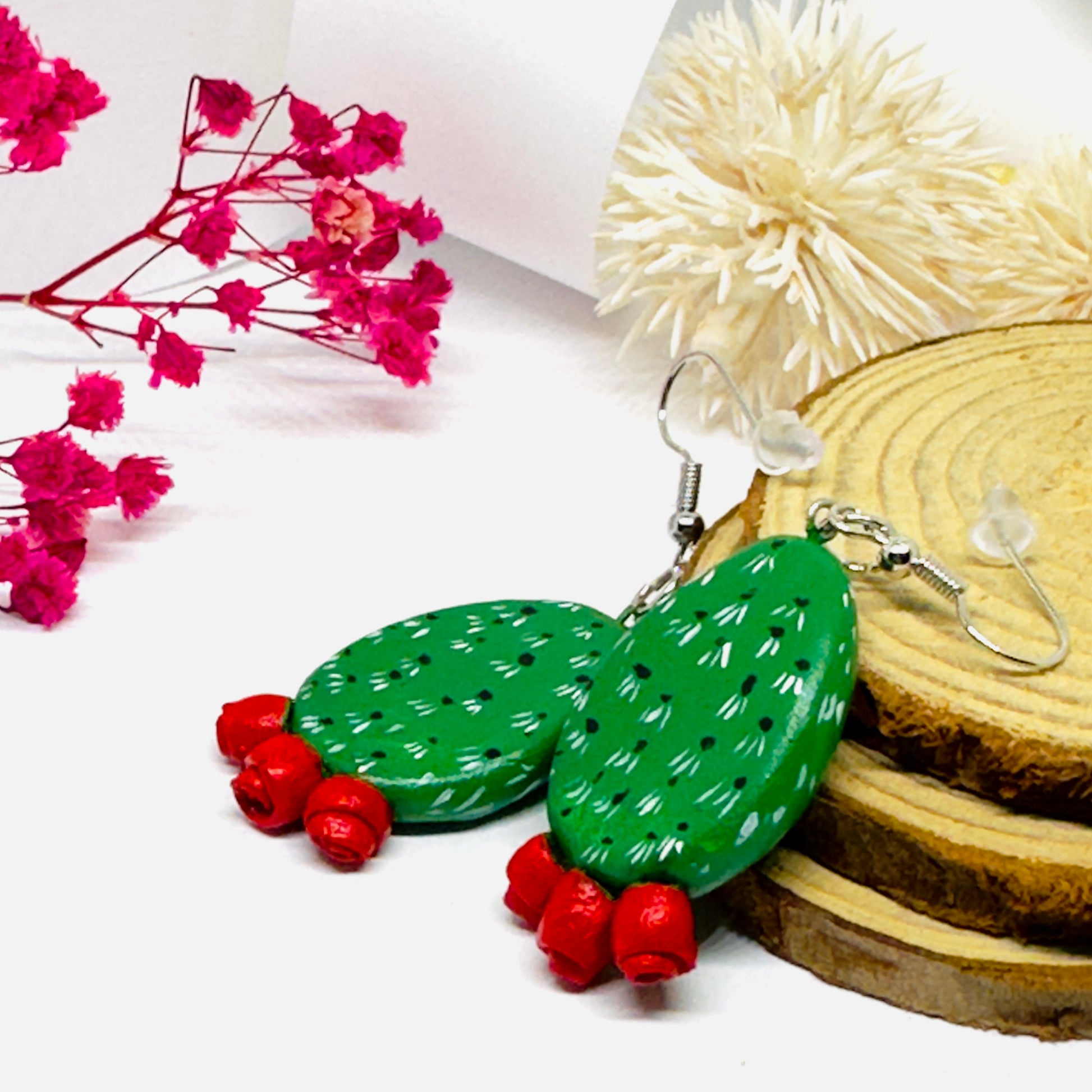 Clay cactus earrings handprinted by Mexican artisans with red cactus flowers for Mexicanias, claywelry, fridalovers, fridamaniacs, and Frida fans. Women girl gift idea.