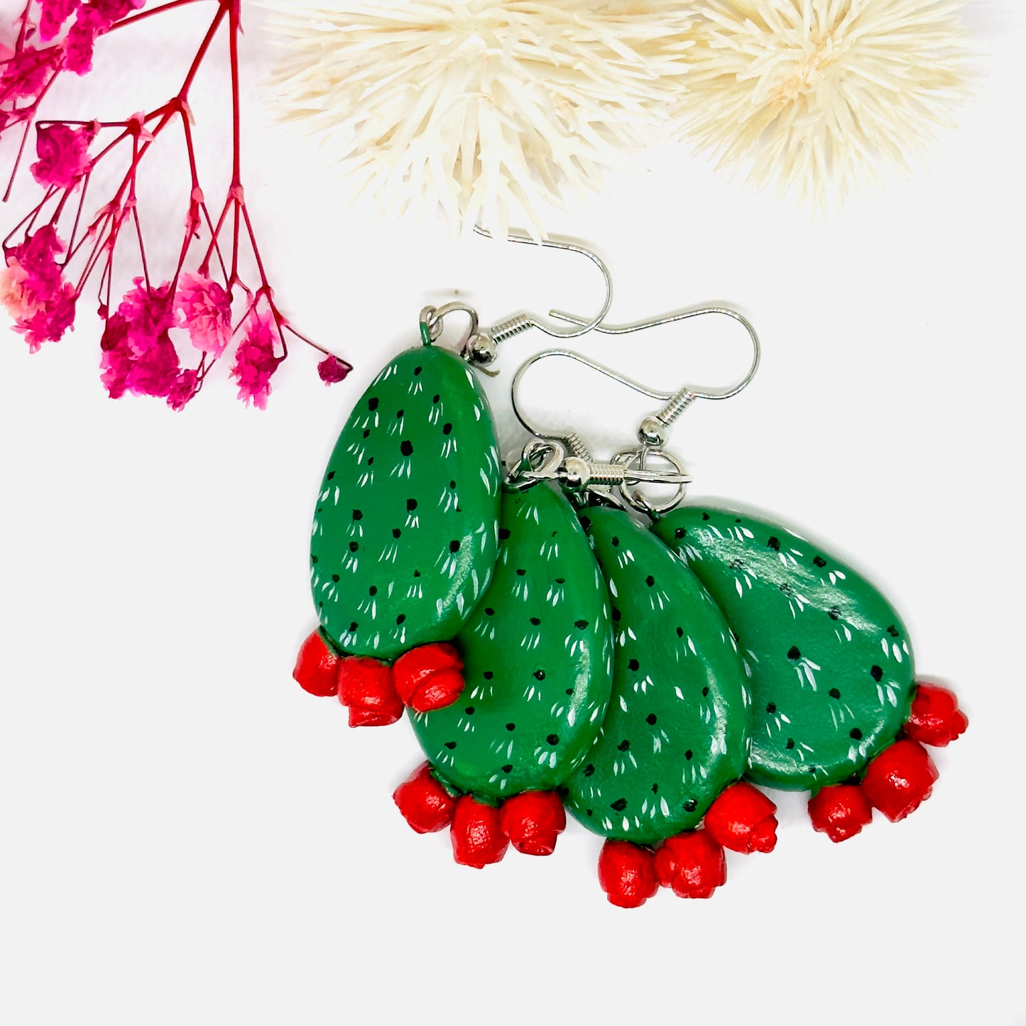 Clay cactus earrings handprinted by Mexican artisans with red cactus flowers for Mexicanias, claywelry, fridalovers, fridamaniacs, and Frida fans. Women girl gift idea.