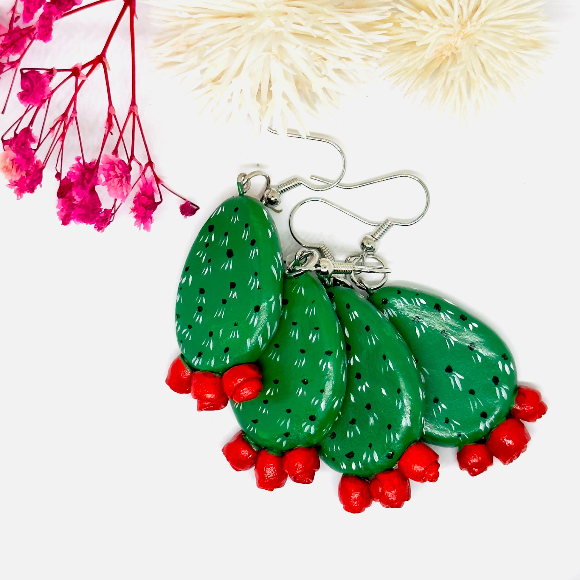 Clay cactus earrings handprinted by Mexican artisans with red cactus flowers for Mexicanias, claywelry, fridalovers, fridamaniacs, and Frida fans. Women girl gift idea.