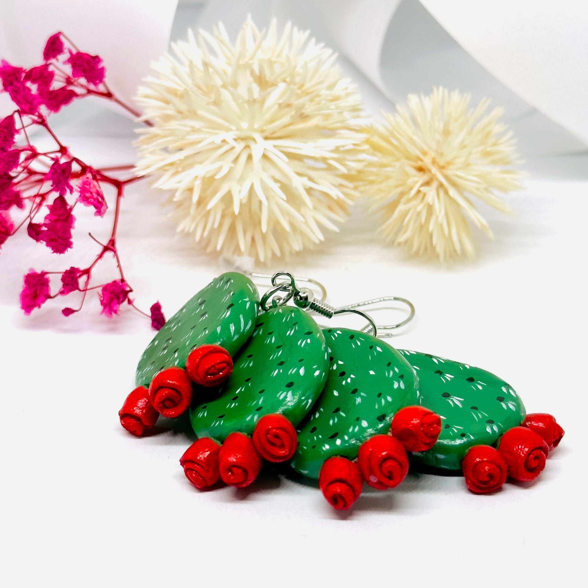 Clay cactus earrings handprinted by Mexican artisans with red cactus flowers for Mexicanias, claywelry, fridalovers, fridamaniacs, and Frida fans. Women girl gift idea.