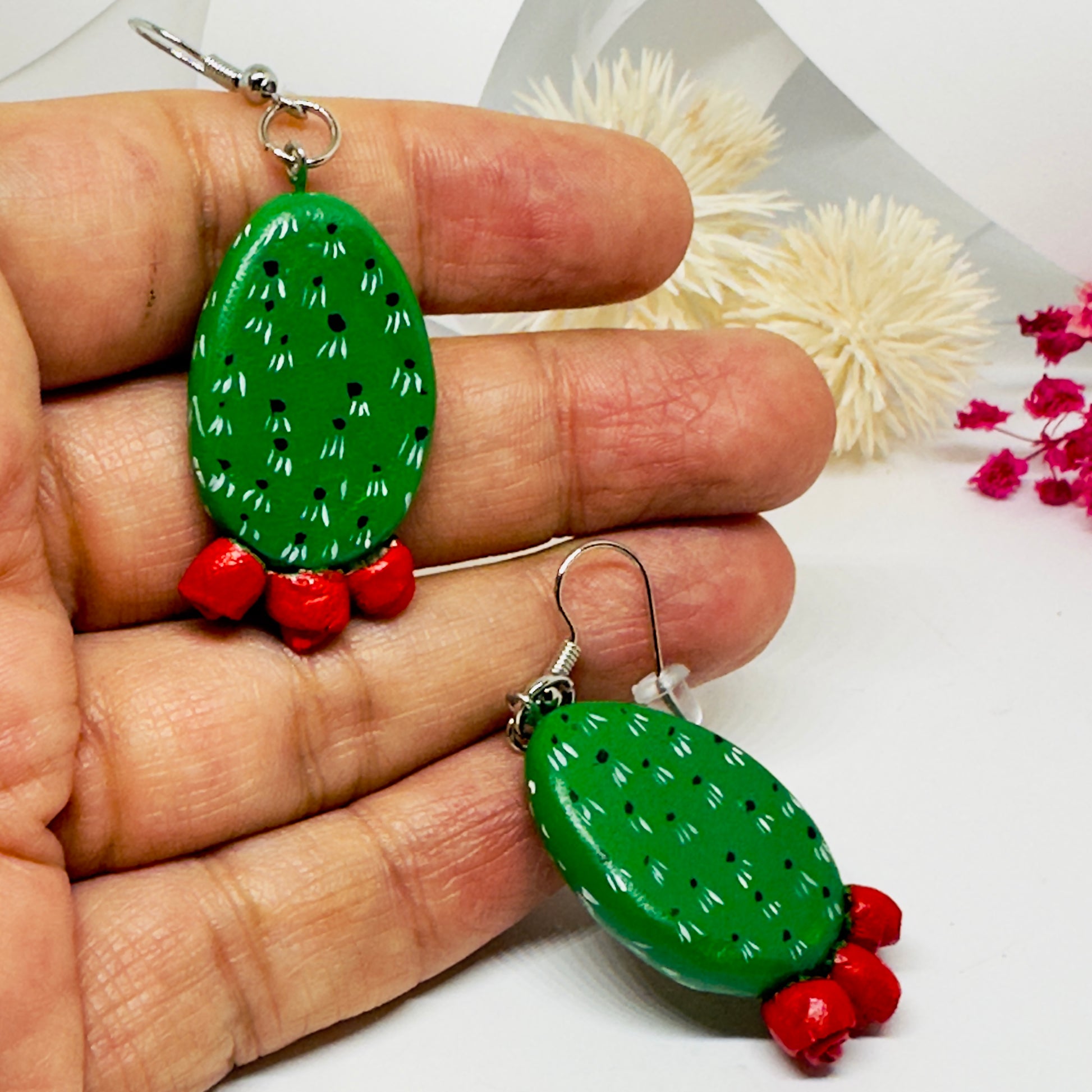 Clay cactus earrings handprinted by Mexican artisans with red cactus flowers for Mexicanias, claywelry, fridalovers, fridamaniacs, and Frida fans. Women girl gift idea.