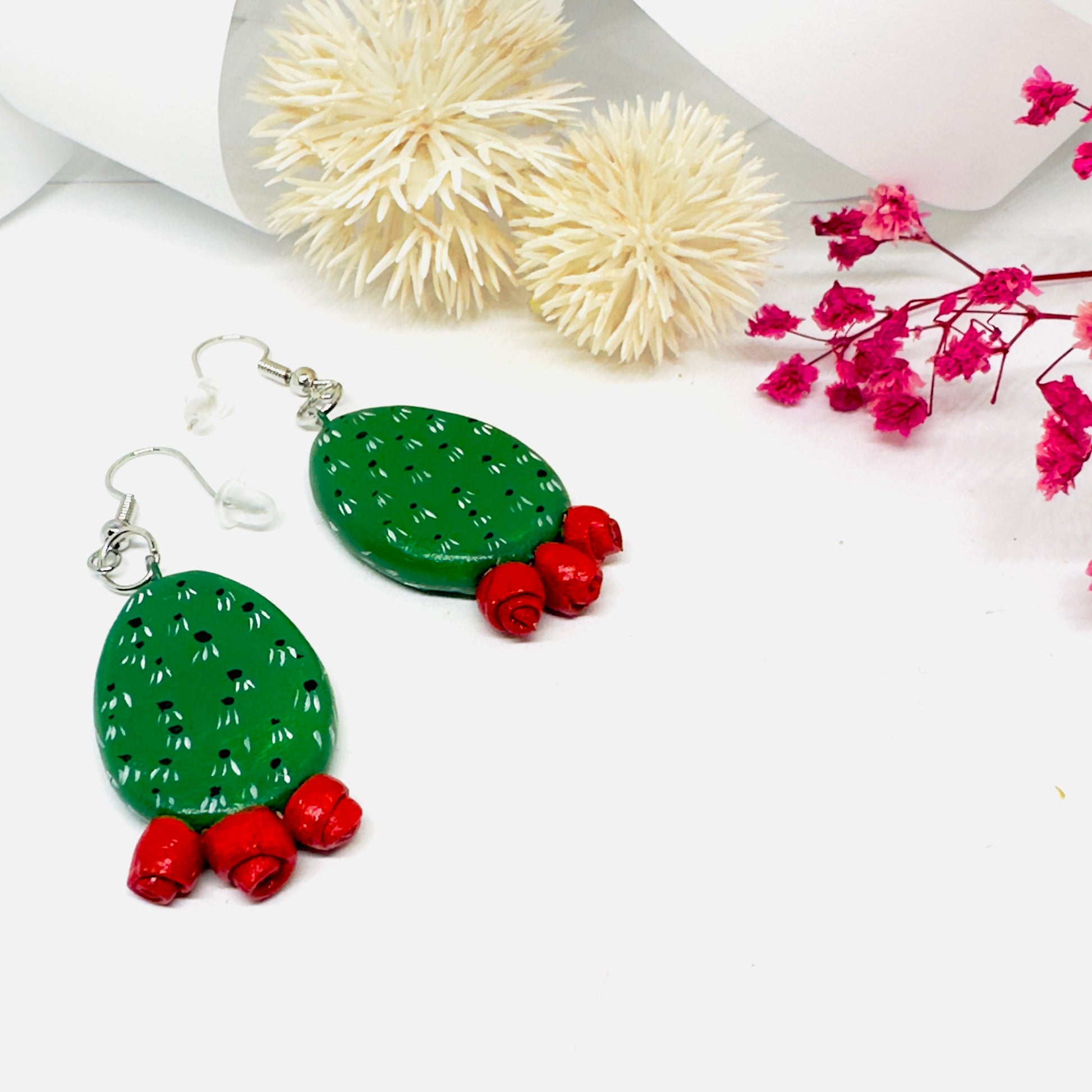 Clay cactus earrings handprinted by Mexican artisans with red cactus flowers for Mexicanias, claywelry, fridalovers, fridamaniacs, and Frida fans. Women girl gift idea.