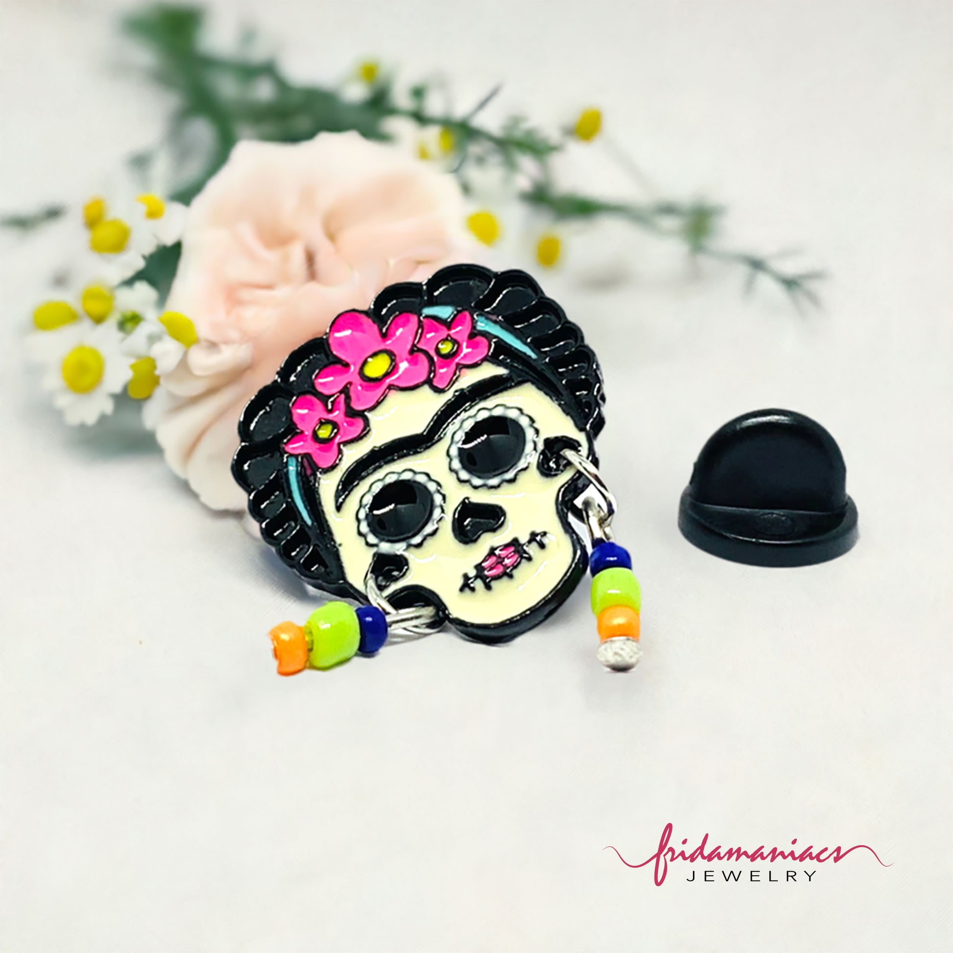Cute Frida Kahlo enamel pin Day of the dead with beaded earrings. Cute, colorful, and original.