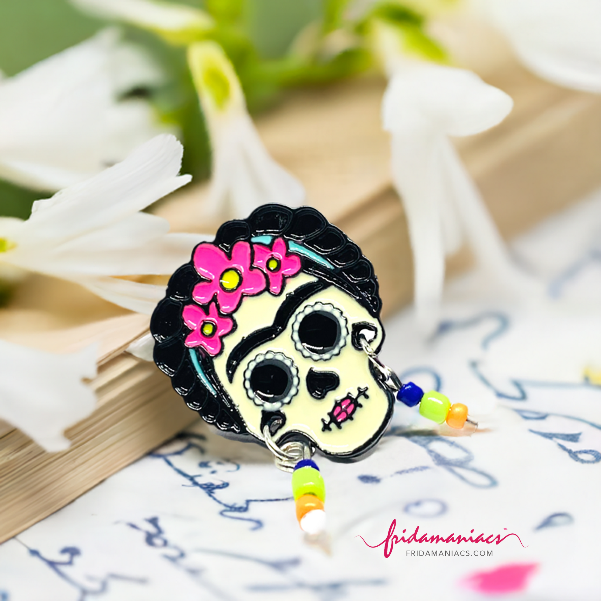 Cute Frida Kahlo enamel pin Day of the dead with beaded earrings. Cute, colorful, and original.