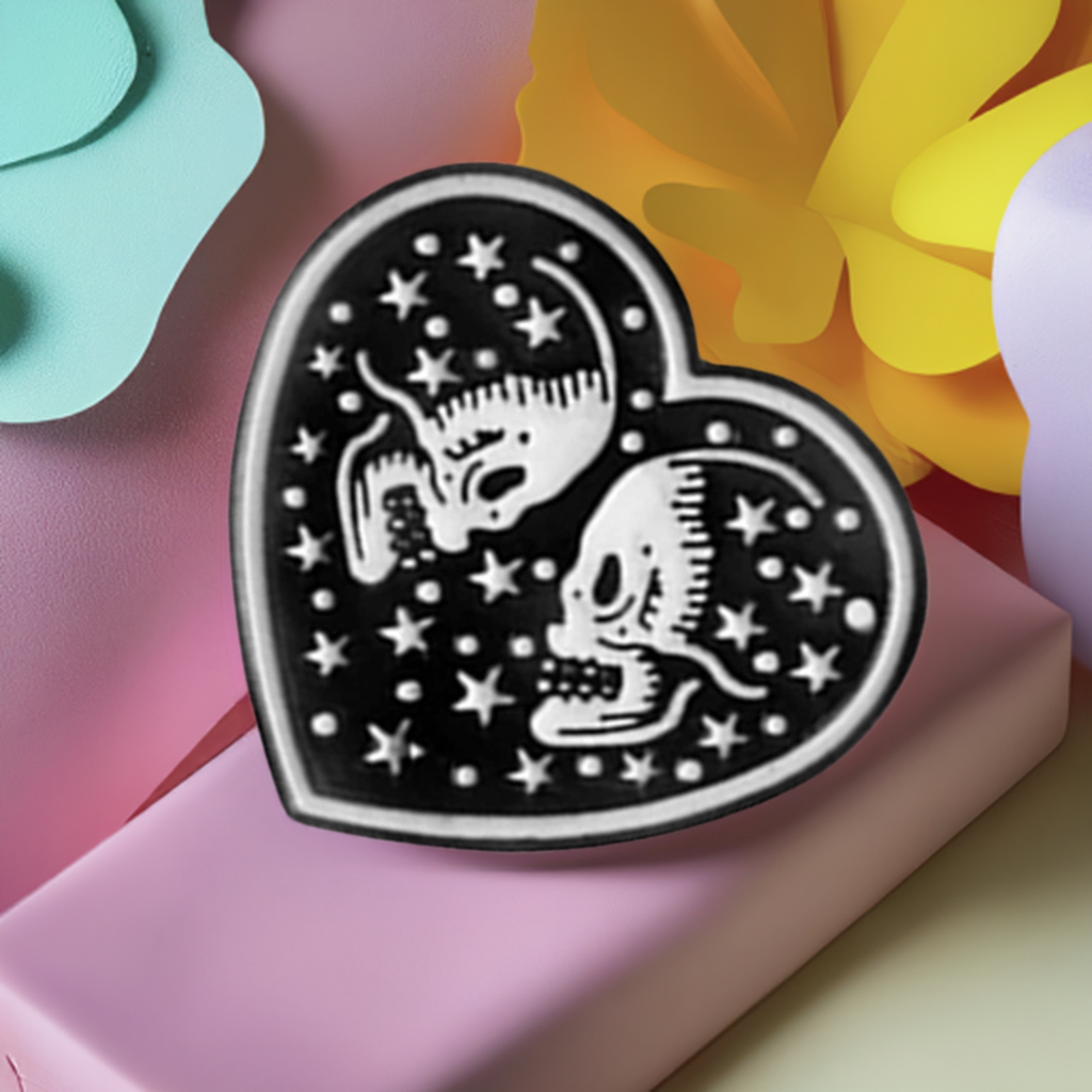 Black Heart with two white skull lovers and stars. Love to die for. Enamel pin back button by Calacamaia. Skull Jewelry accessory