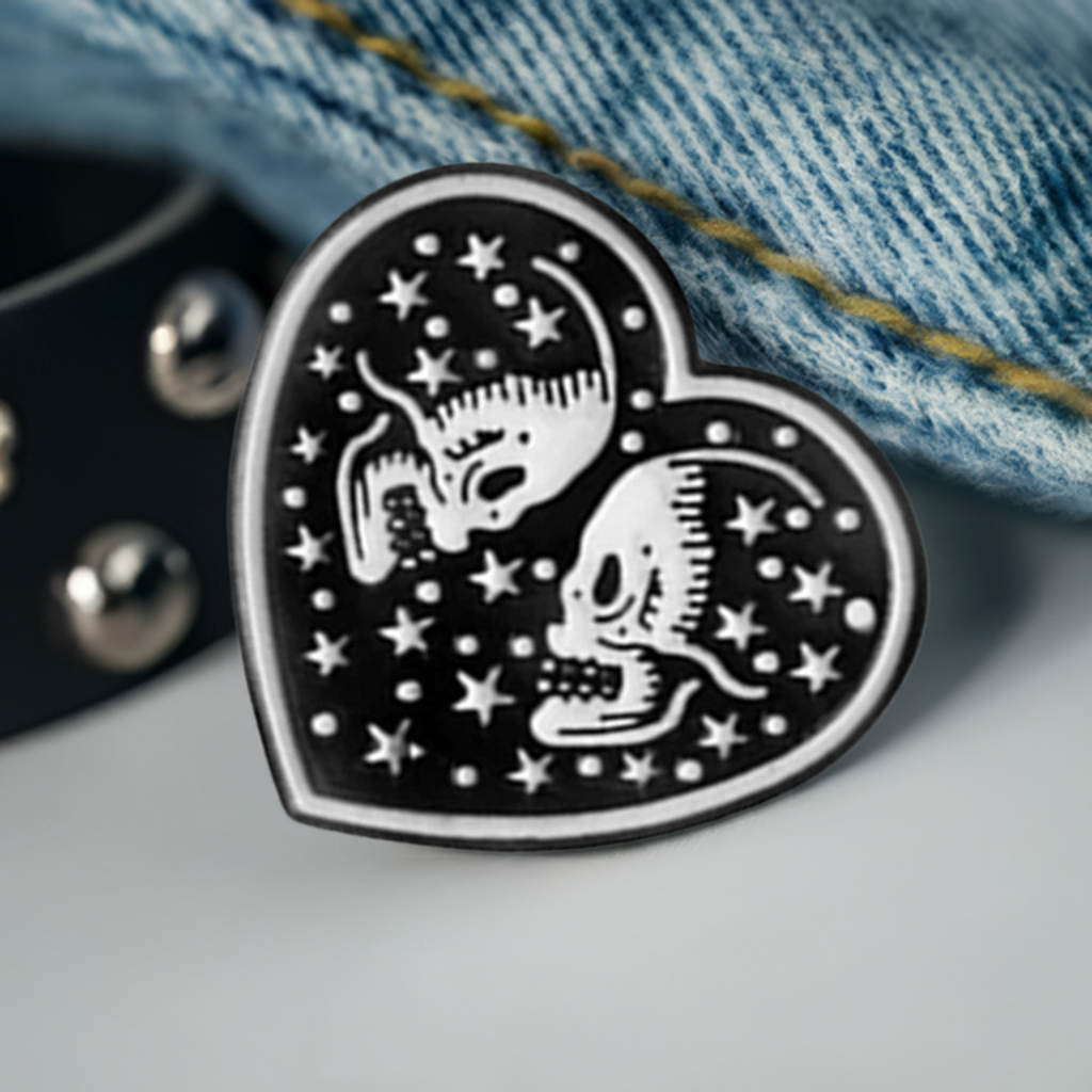 Black Heart with two white skull lovers and stars. Love to die for. Enamel pin back button by Calacamaia. Skull Jewelry accessory