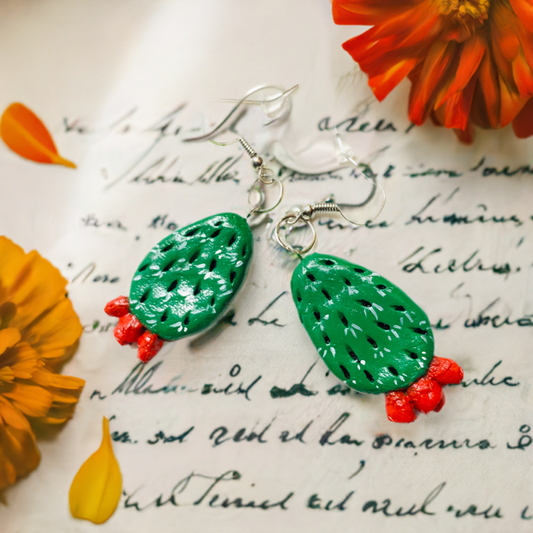 Handmade and hand painted cactus clay earrings. Fresh green and fire vivid red cactus flowers. Handcrafted by Mexican artisans. This cactus feature carved spikes. Mexico folk art for women and girls. Mexican earrings. Mexico jewelry.
