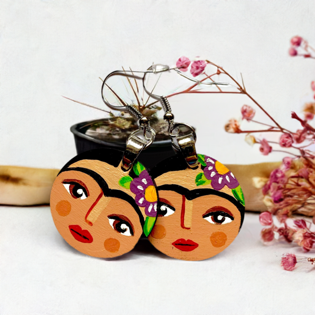 Hand painted round wooden Frida Kahlo inspired earrings. Mexican earrings by Fridamaniacs. Mexican jewelry for girls. Cute original gift idea. Colorful circular earrings painted by hand for Fridaloers