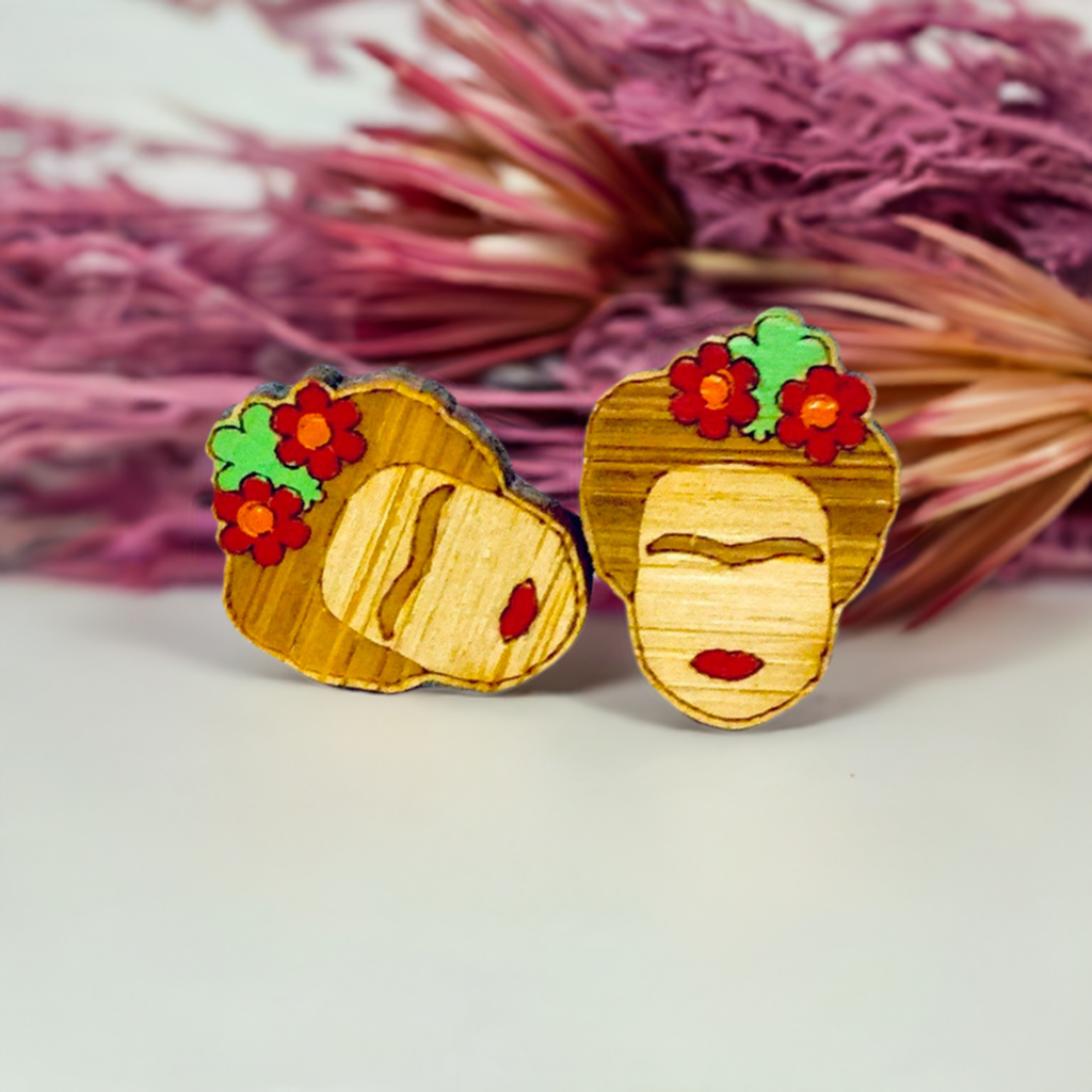 Floral Mini Bamboo Frida Kahlo inspired handpainted bamboo stud earrings with red flowers, green leaves, iconic eyebrows, and red lips for fridamaniacs, fridalovers, fridamania, frida fans girls. Cool gift idea. Mexican earrings. Mexican jewelry. Cute and original women jewelry accessories.