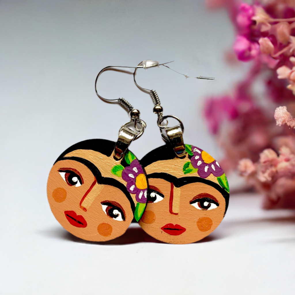 Hand painted round wooden Frida Kahlo inspired earrings. Mexican earrings by Fridamaniacs. Mexican jewelry for girls. Cute original gift idea. Colorful circular earrings painted by hand for Fridaloers