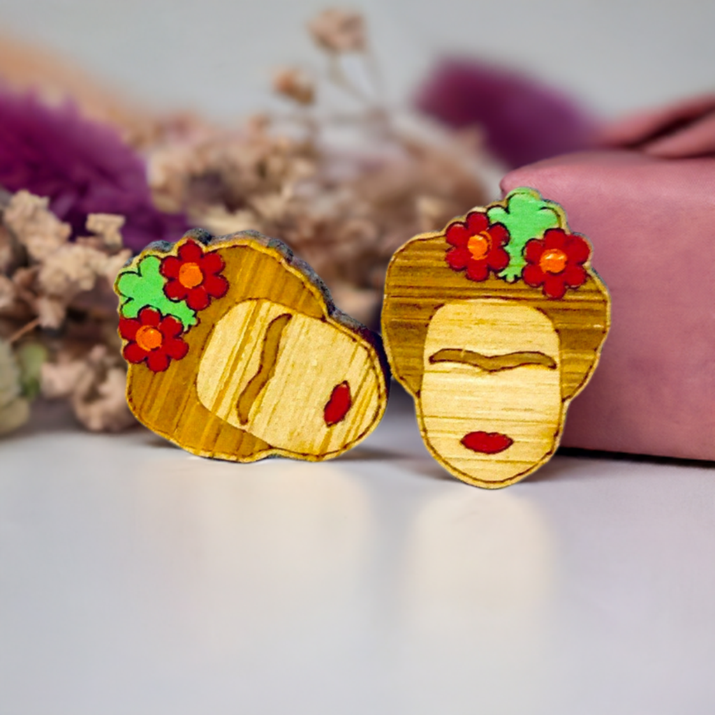 Floral Mini Bamboo Frida Kahlo inspired handpainted bamboo stud earrings with red flowers, green leaves, iconic eyebrows, and red lips for fridamaniacs, fridalovers, fridamania, frida fans girls. Cool gift idea. Mexican earrings. Mexican jewelry. Cute and original women jewelry accessories.