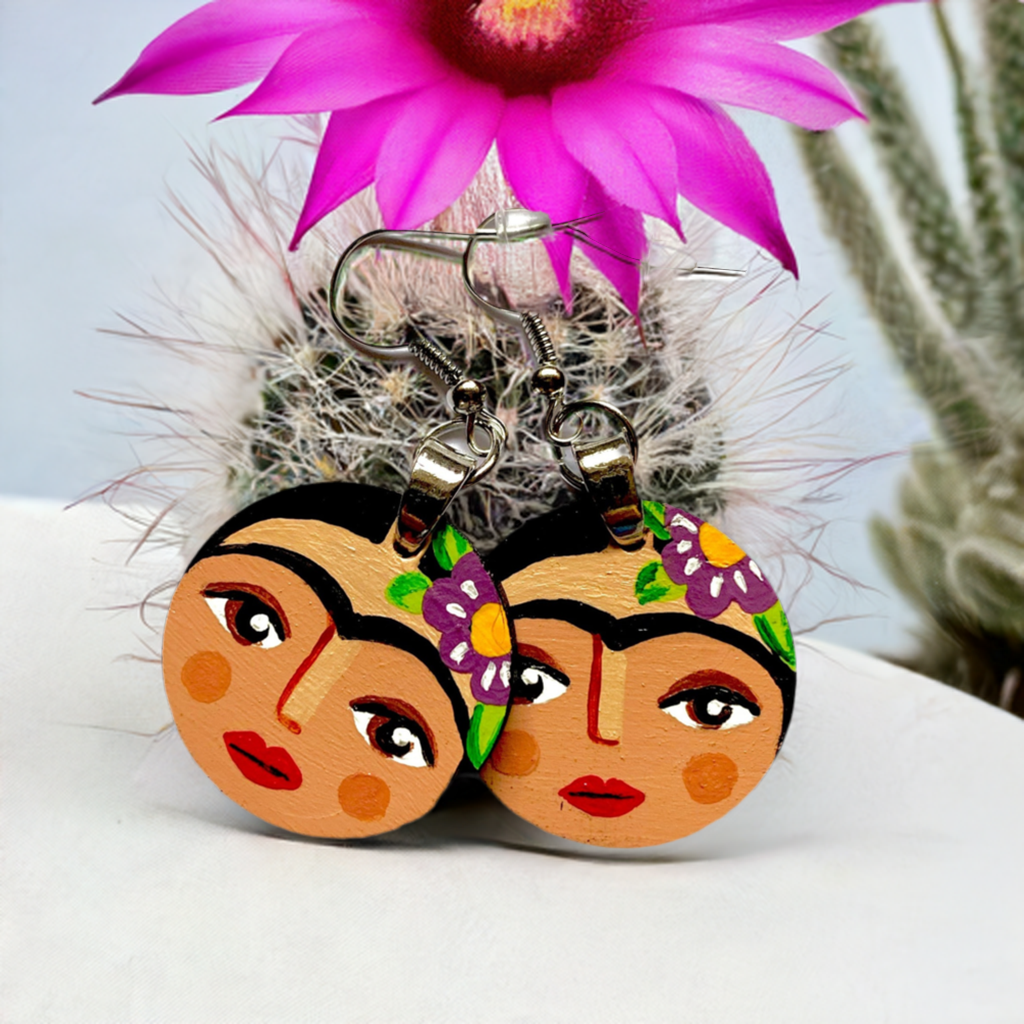 Hand painted round wooden Frida Kahlo inspired earrings. Mexican earrings by Fridamaniacs. Mexican jewelry for girls. Cute original gift idea. Colorful circular earrings painted by hand for Fridaloers