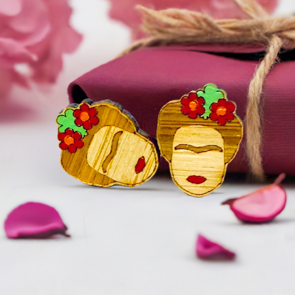 Floral Mini Bamboo Frida Kahlo inspired handpainted bamboo stud earrings with red flowers, green leaves, iconic eyebrows, and red lips for fridamaniacs, fridalovers, fridamania, frida fans girls. Cool gift idea. Mexican earrings. Mexican jewelry. Cute and original women jewelry accessories.