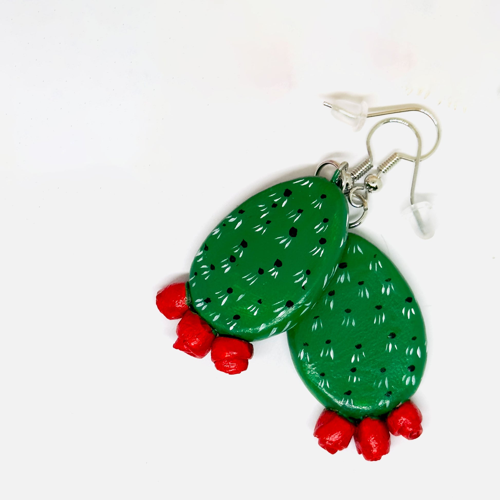 Clay cactus earrings handprinted by Mexican artisans with red cactus flowers for Mexicanias, claywelry, fridalovers, fridamaniacs, and Frida fans. Women girl gift idea.