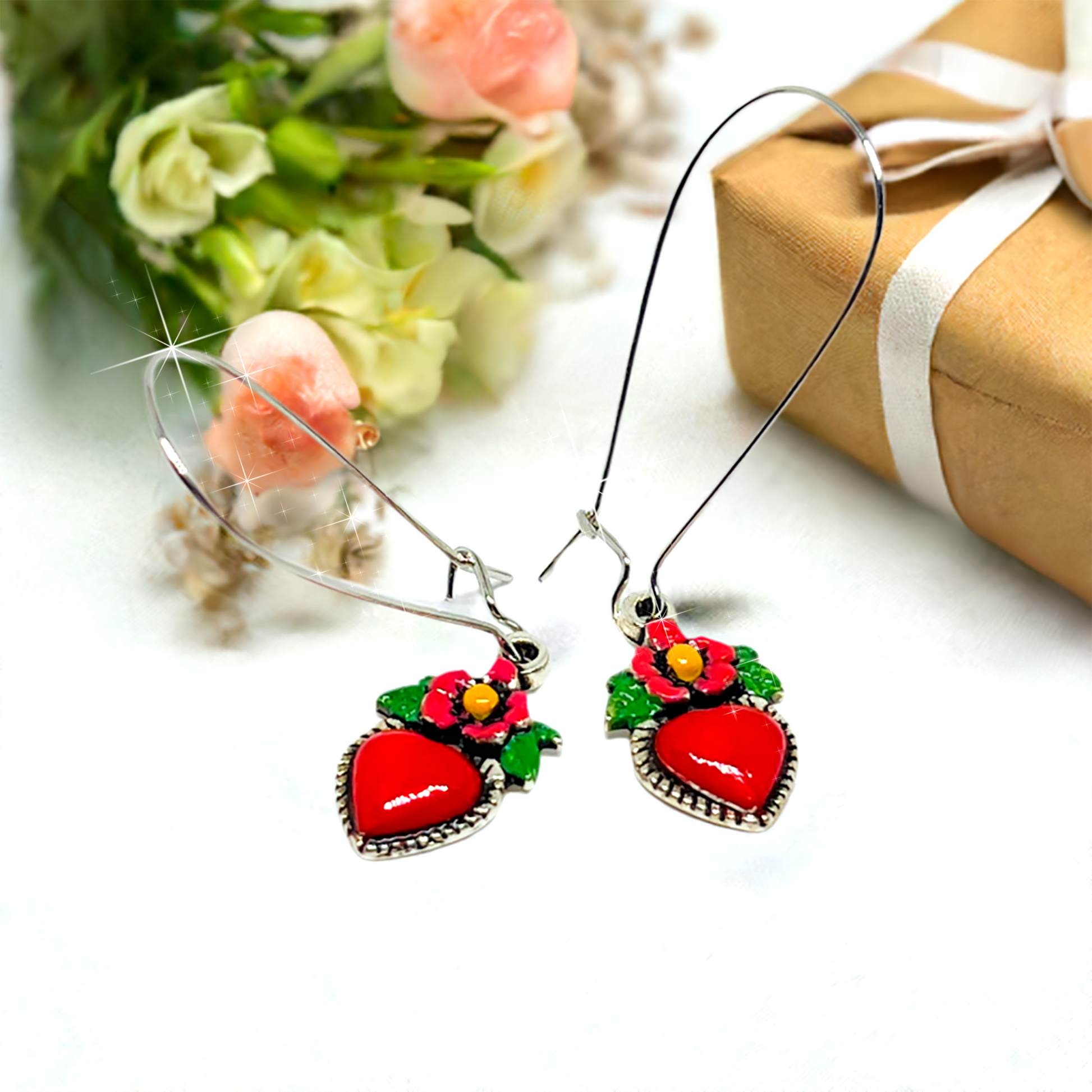 Red enamel heart earrings with long silver earwires. Mexican earrings. Mexican jewelry.