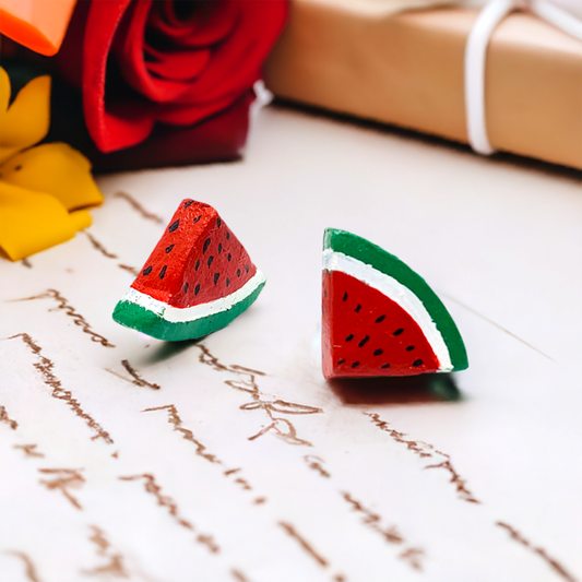 Clay Watermelon Triangle earrings. Watermelon clay earrings. Handmade and handpainted by Mexcian artisans. Mexican earrings. Mexican clay jewelry. Stud clay food jewelry for girls and women. Mexico folk art to wear by Claywelry.