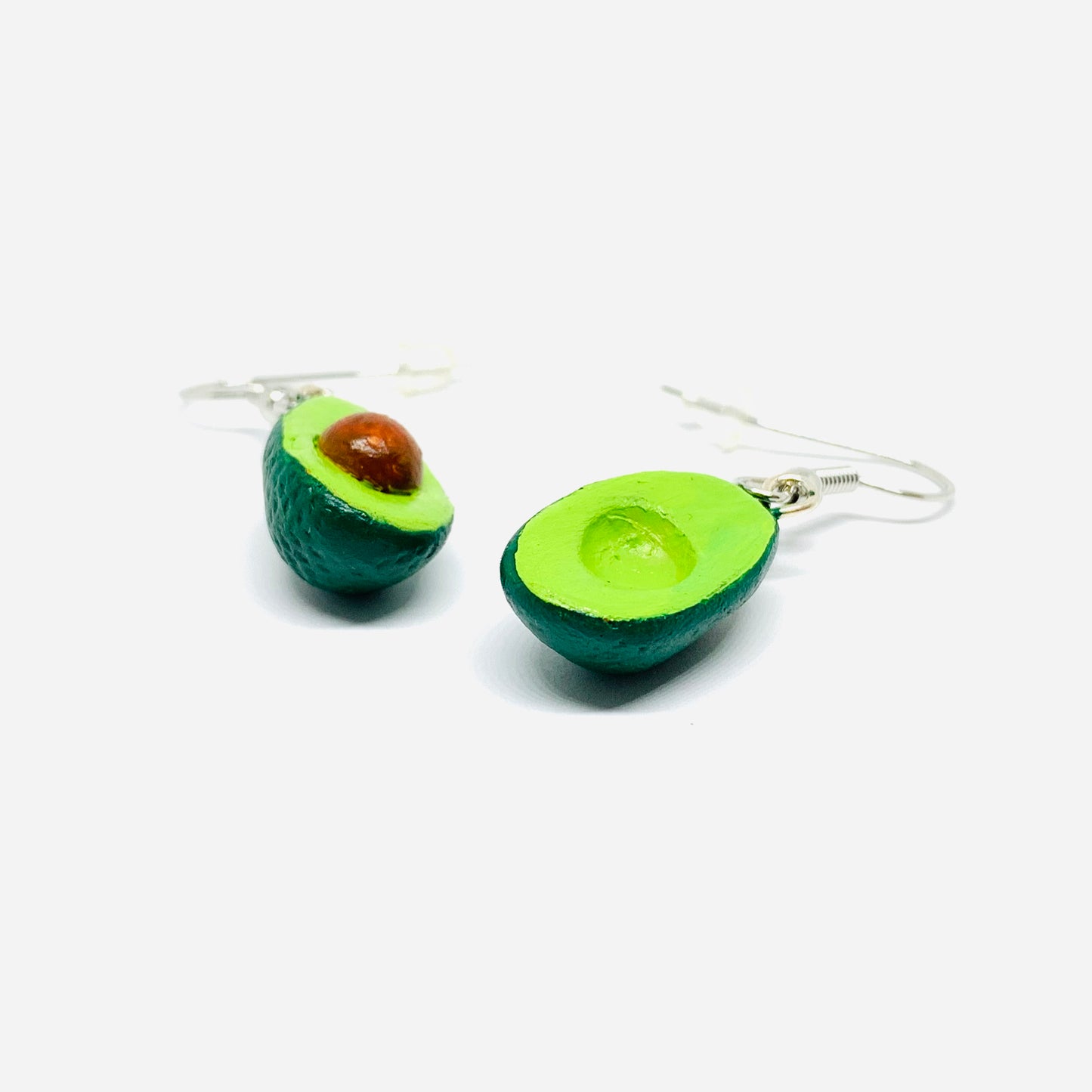Avocado Earrings made of natural clay and hand painted. Drop and dangle. Mexican jewelry food. Mexico folk art to wear. Aretes de aguacate pintados a mano para mujer. Fridamaniacs, Frida kahlo inspired wearable art and accessories