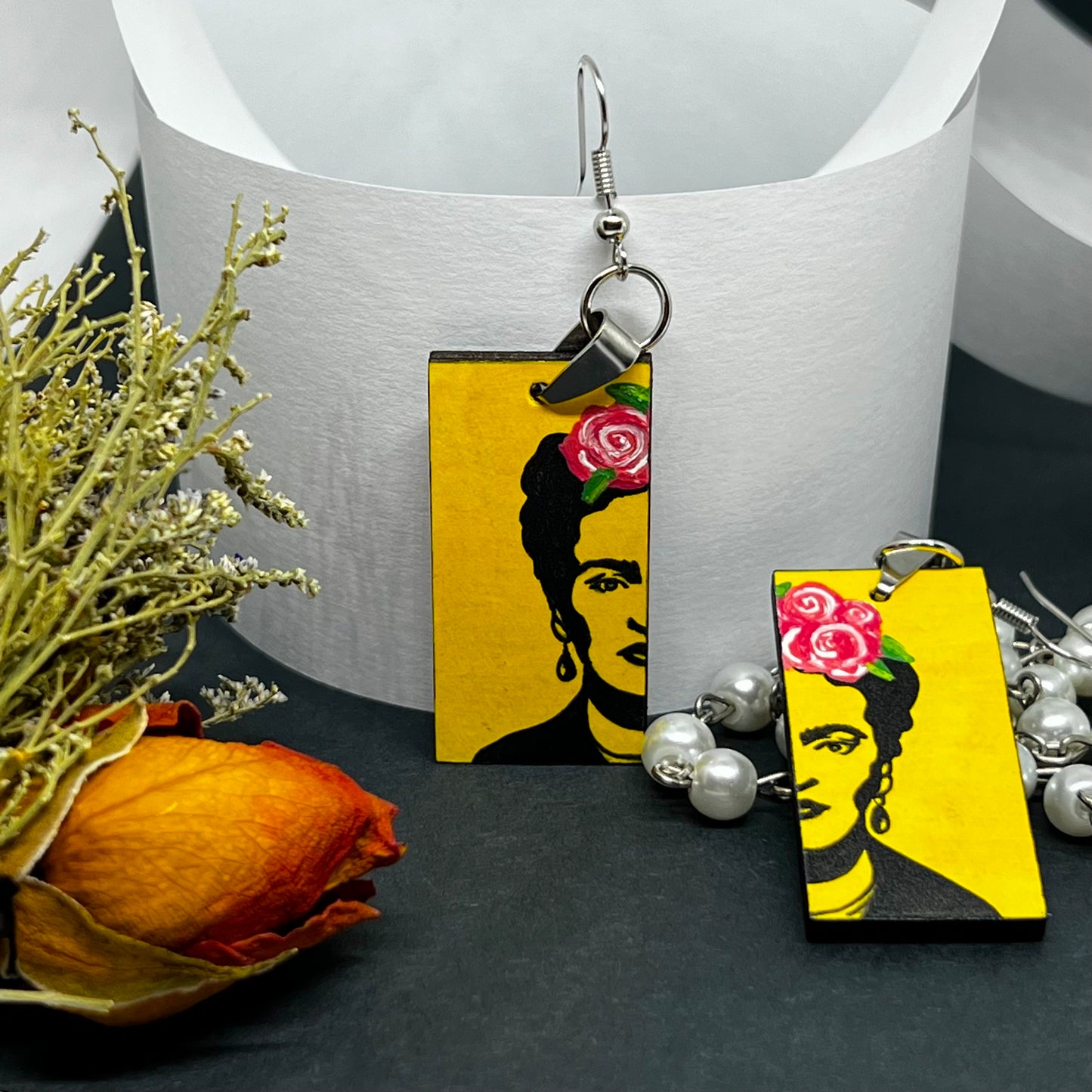 Frida Kahlo Stencil Art with Yellow Background and Hand Painted Pink Roses. Wearable art for girls. Cute and original gift idea. Floral jewelry inspired Mexican Artist and Mexico Folk Art. Aretes Frida Kahlo Amarillos con Rosas para Mujer.