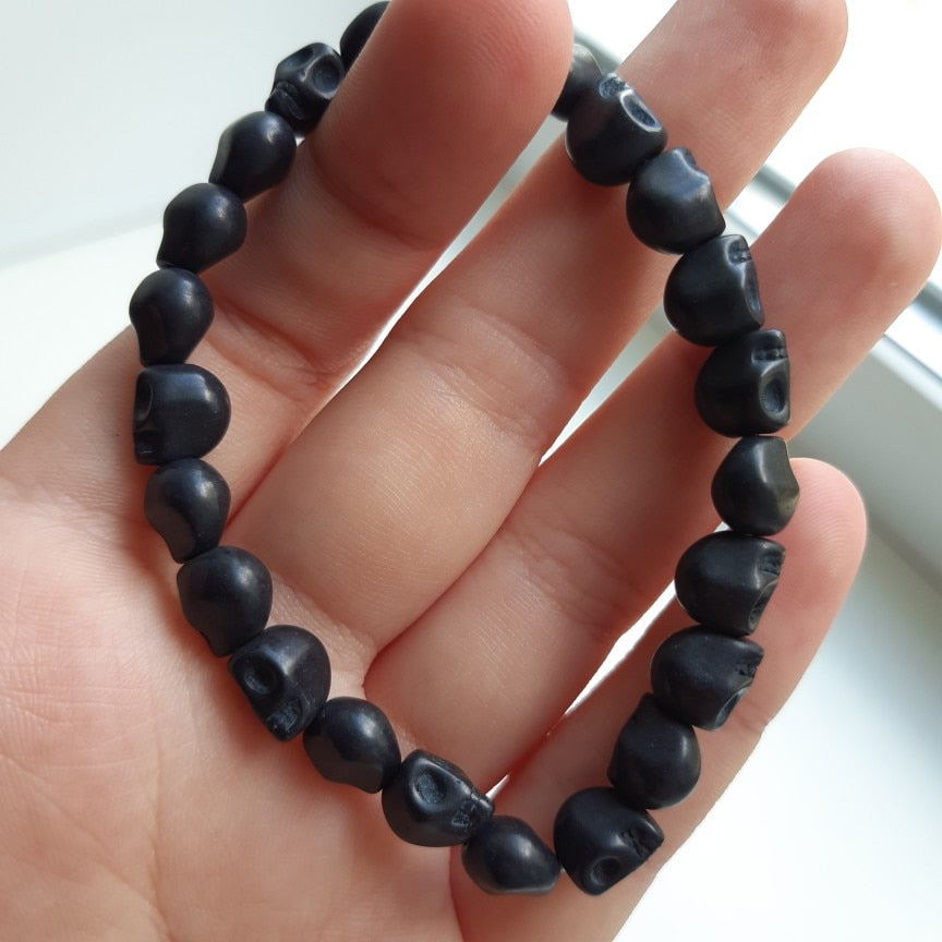 Black skull bracelet made of natural stone beads. Unisex wristband Day of the dead or Dia de Muertos Mexican Jewelry. Boys gift idea. Trendy Halloween accessories by Fridamaniacs Frida Inspired boutique