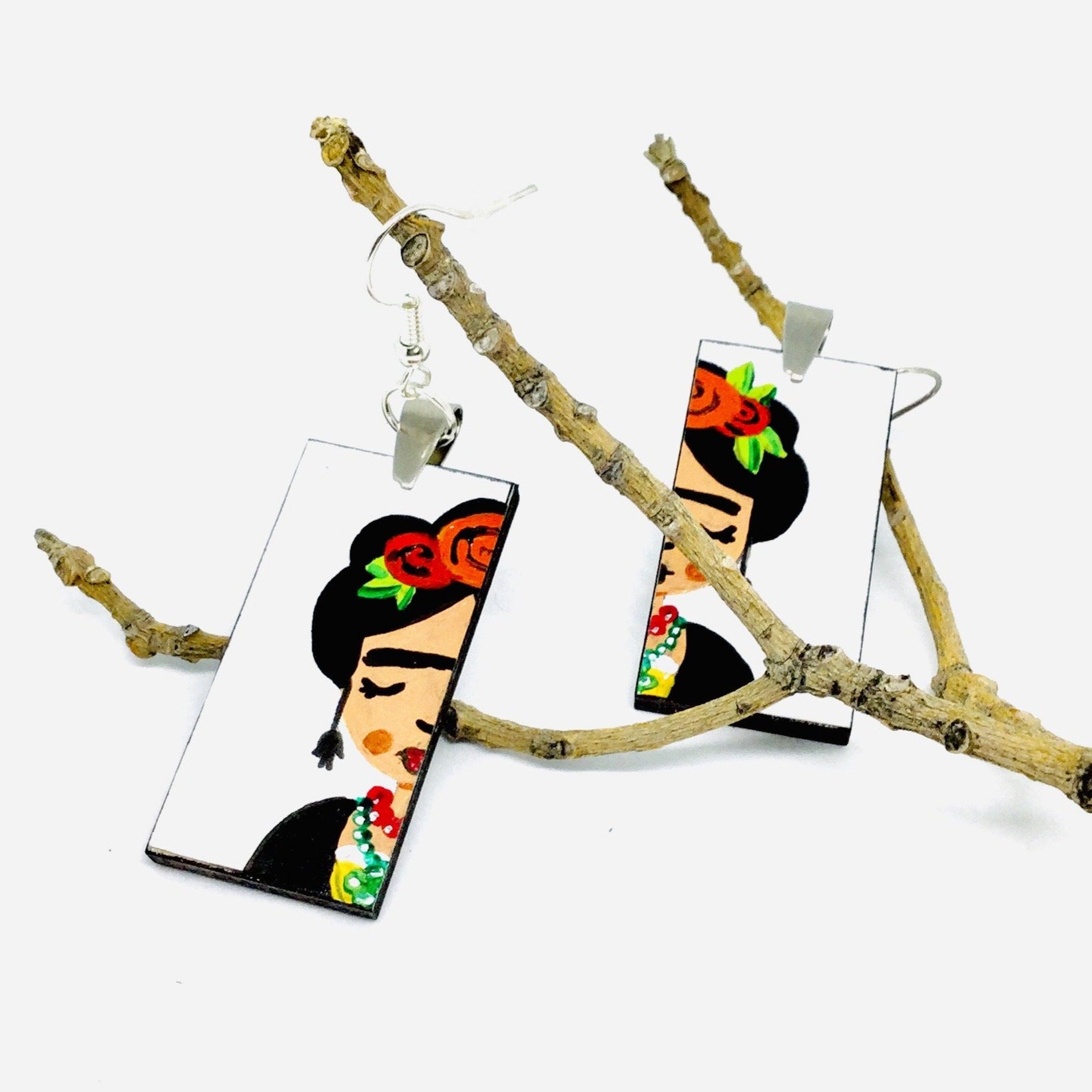 Frida earrings: Frida Kahlo inspired handpaied wooden earrings. Mexican jewelry by Fridamaniacs