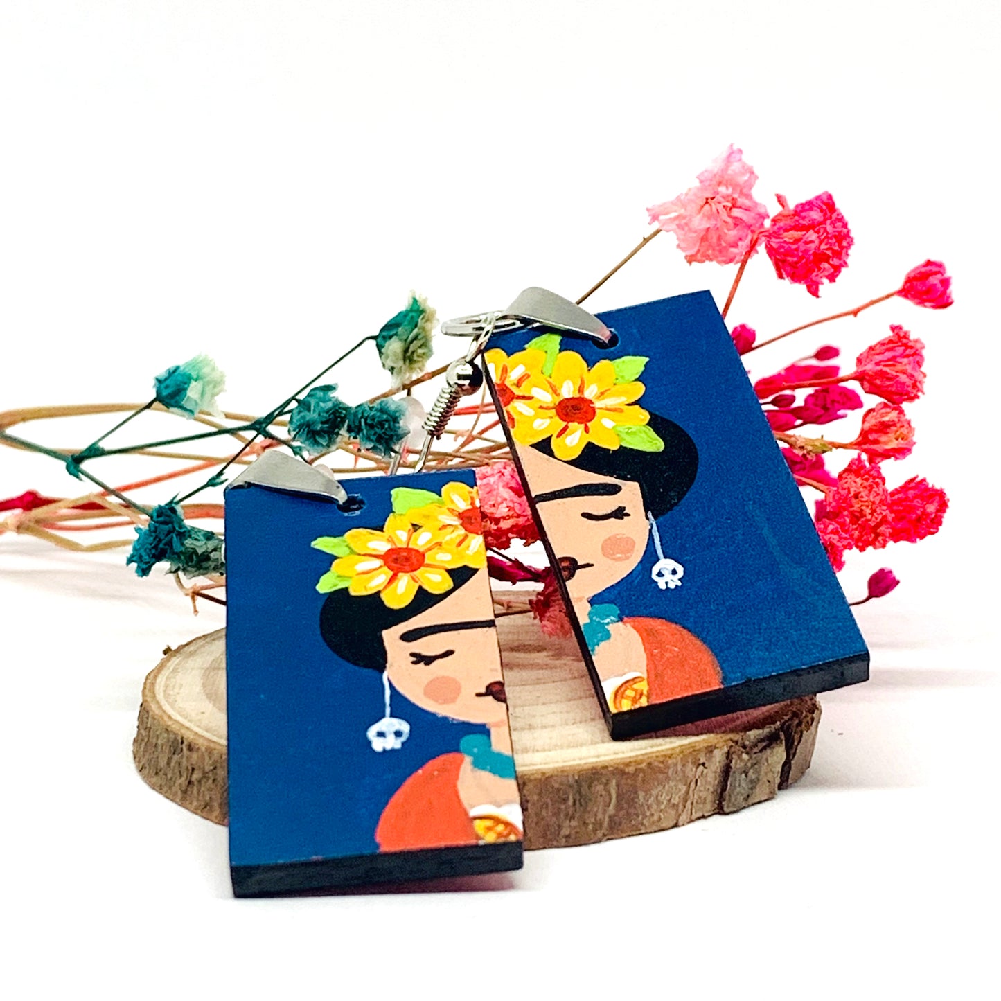 Frida Earrings: Hand painted Frida Kahlo earrings made of wood. Mexican jewelry. Acrylic blue indigo, orange, and yellow flowers. Girl gift idea. Trendy fashion. Aretes pintados a mano. Mexico folk art to wear-wearable art. Women and girls birthday gift idea