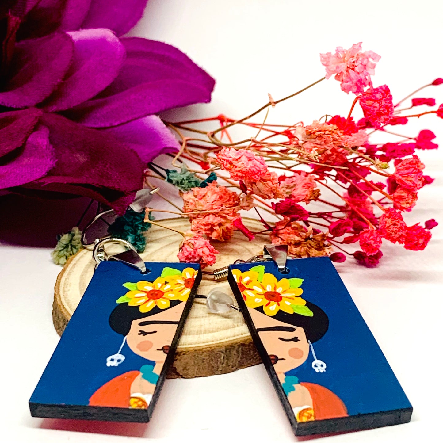 Frida Earrings: Hand painted Frida Kahlo earrings made of wood. Mexican jewelry. Acrylic blue indigo, orange, and yellow flowers. Girl gift idea. Trendy fashion. Aretes pintados a mano. Mexico folk art to wear-wearable art. Women and girls birthday gift idea