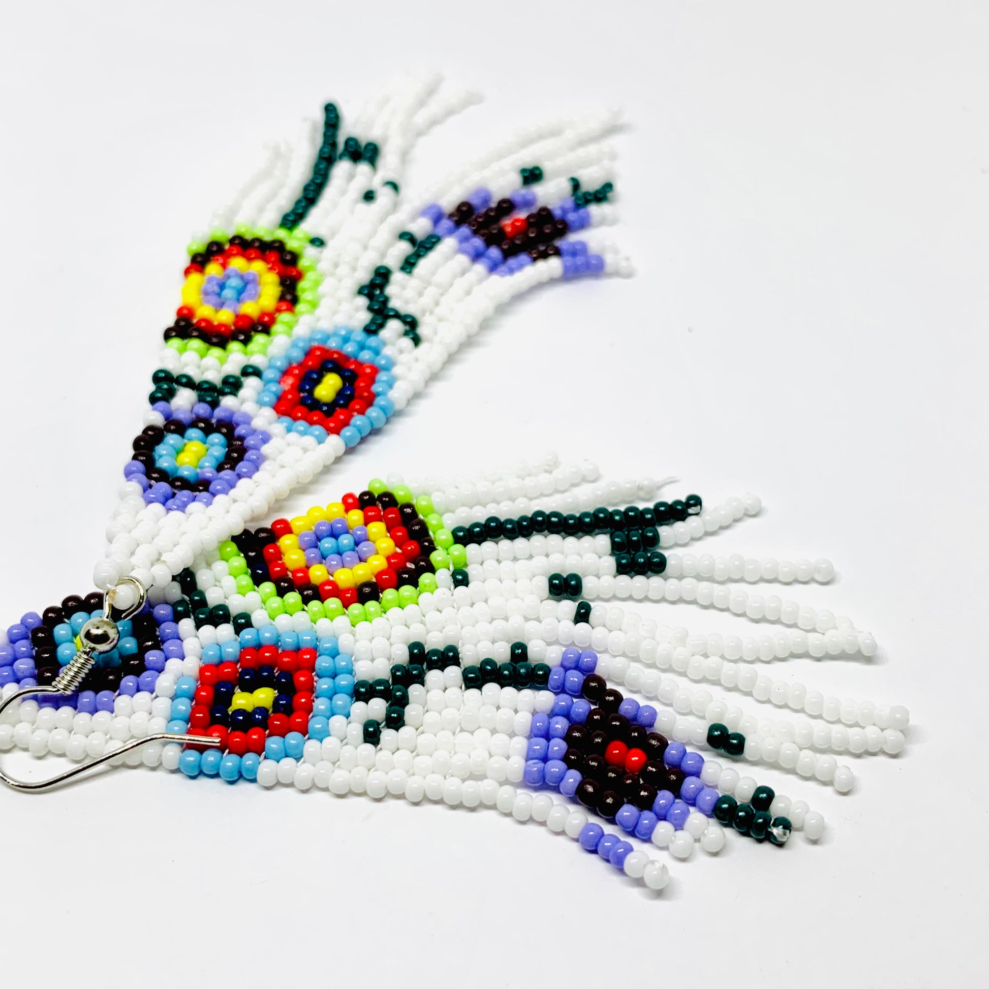Beaded Mexican earrings Handmade with white, purrple, yellow, red, green and black floral pattern beads. Frida Kahlo inspired jewelry mexico folk art.
