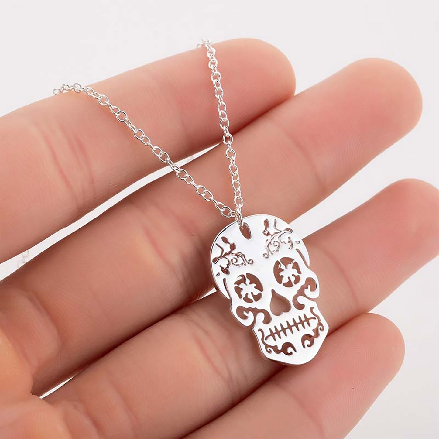 Sugar skull necklace and pendant. Mexican silver, gold or rose gold metallic skeleton jewelry. Collar de calavera de azucar. Mexico folk art. Hollow style. Latinx culture accessories by Fridamaniacs