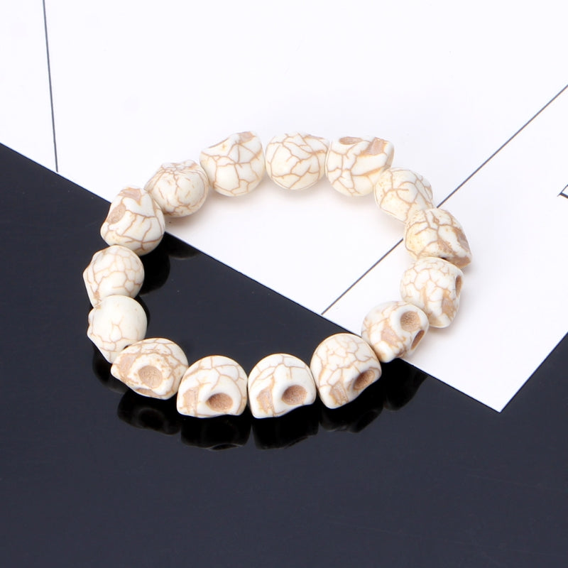 Skull bracelet made of natural stone beads by fridamaniacs day of the dead jewelry and accessories. Mexican jewelry. Brazalete de calaveras. Mexico folk art