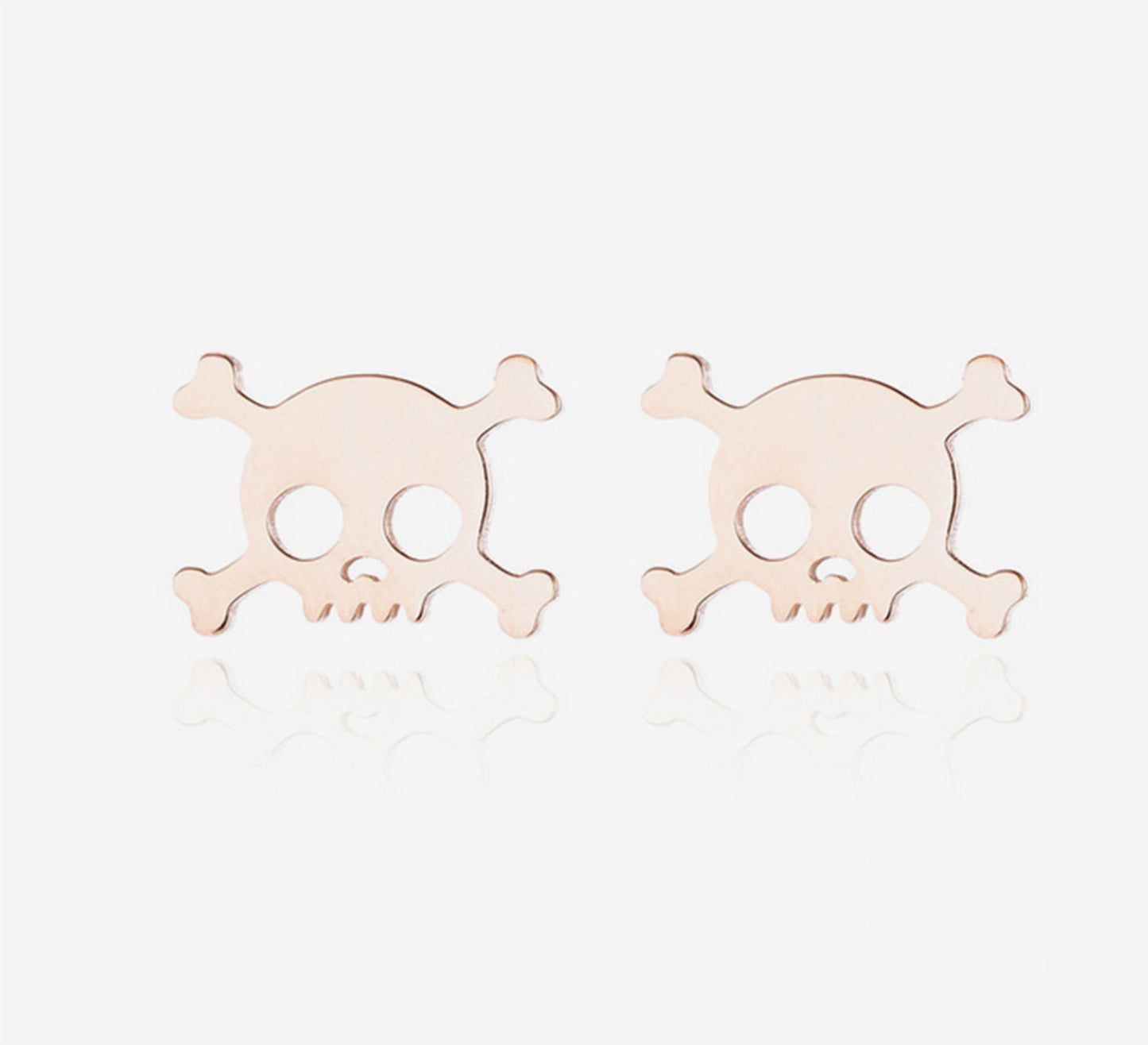 Rose gold skull earrings. Mini stud silver pendants by fridamaniacs jewelry and accessories