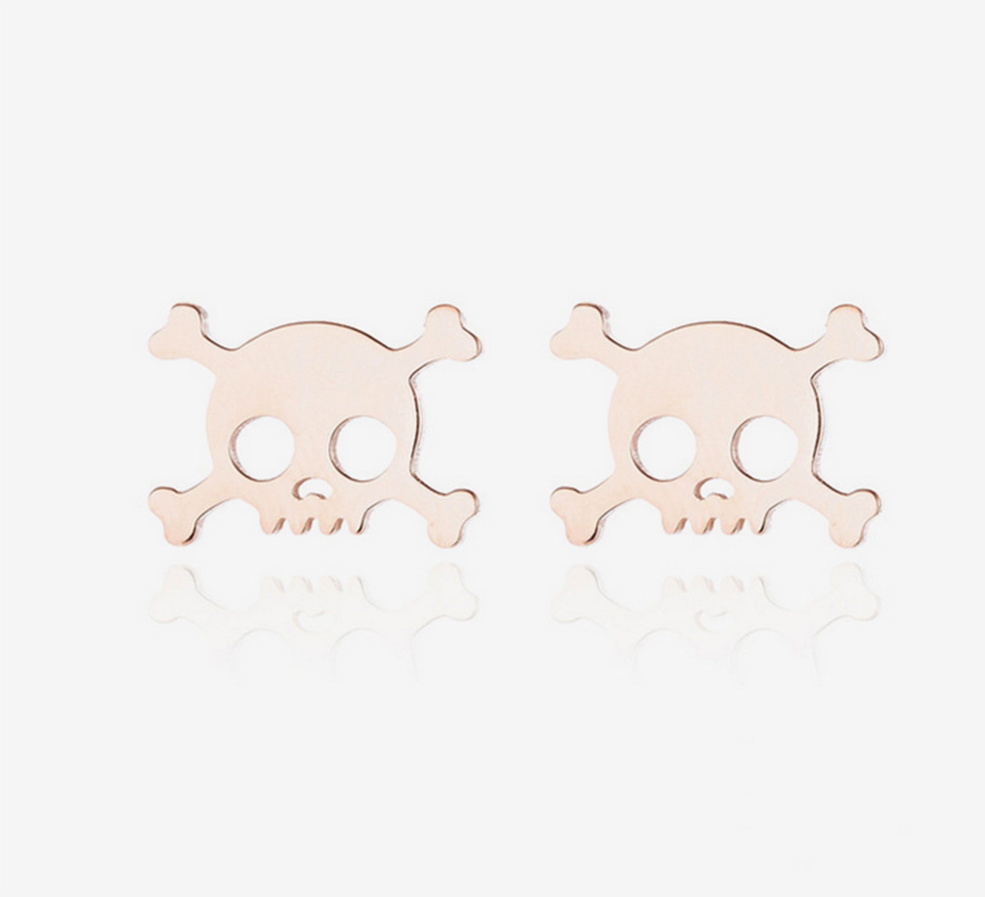 Rose gold skull earrings. Mini stud silver pendants by fridamaniacs jewelry and accessories