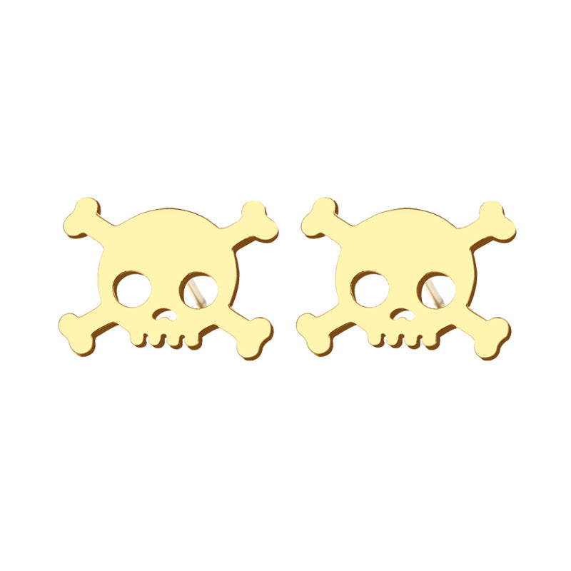 Gold skull earrings. Mini stud silver pendants by fridamaniacs jewelry and accessories