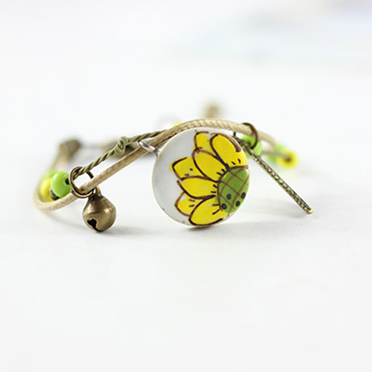 Sunflower Clay Bracelet: Hand painted and handmade ceramic sunflower wristband bracelet for women and girls inspired by Frida Kahlo and Mexican Folk Art Jewelry