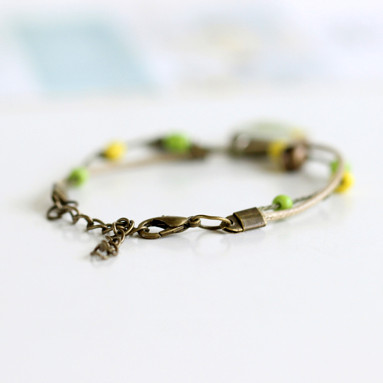 Sunflower Clay Bracelet: Hand painted and handmade ceramic sunflower wristband bracelet for women and girls inspired by Frida Kahlo and Mexican Folk Art Jewelry