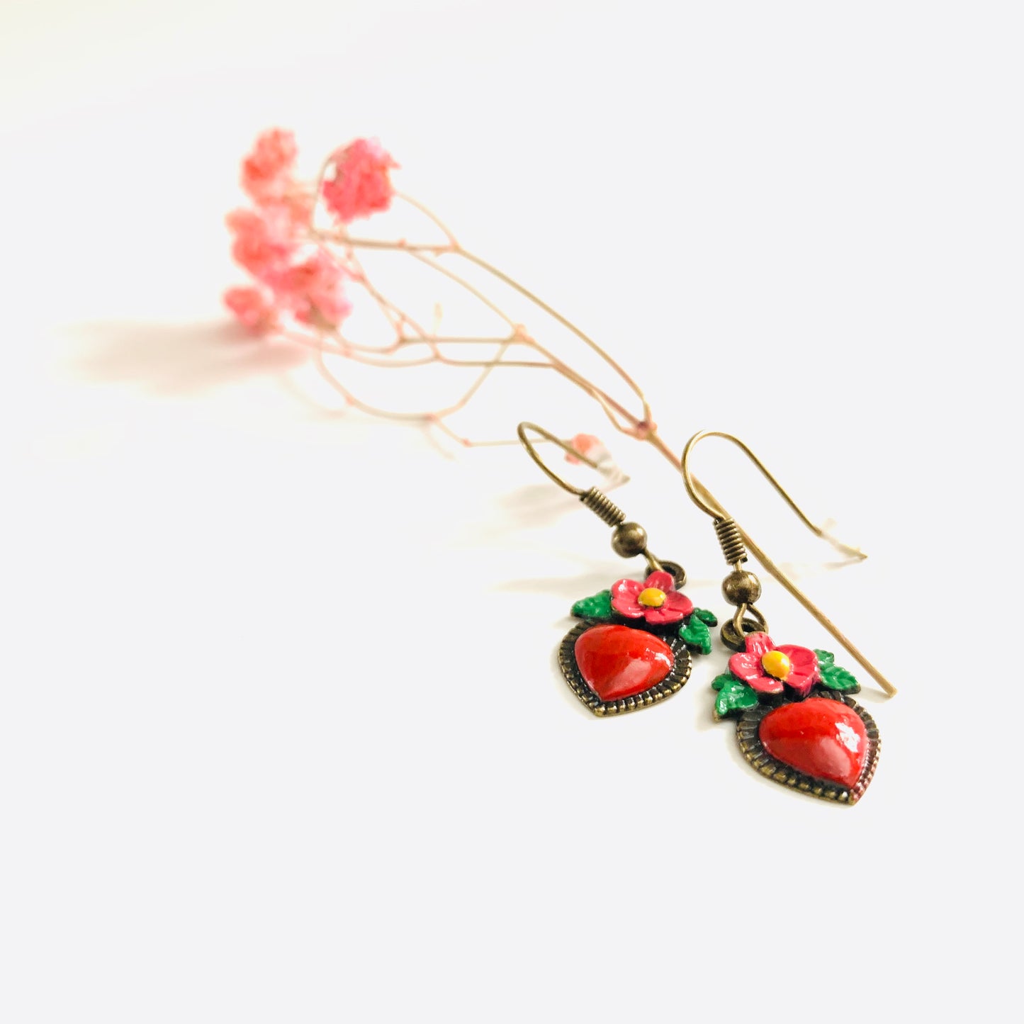 Bronze hand painted heart and flower earrings. Red, pink, green, and yellow paint. Mexican earrings. Mexican jewelry for fridamaniacs, fridalovers, fridamania. Frida Kahlo. Mother's Day gift.