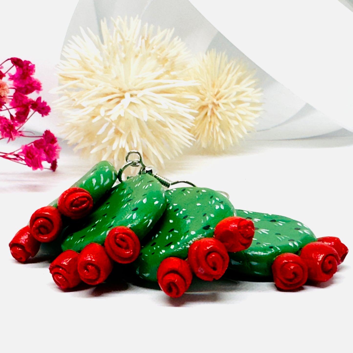 Clay cactus earrings handprinted by Mexican artisans with red cactus flowers for Mexicanias, claywelry, fridalovers, fridamaniacs, and Frida fans. Women girl gift idea.