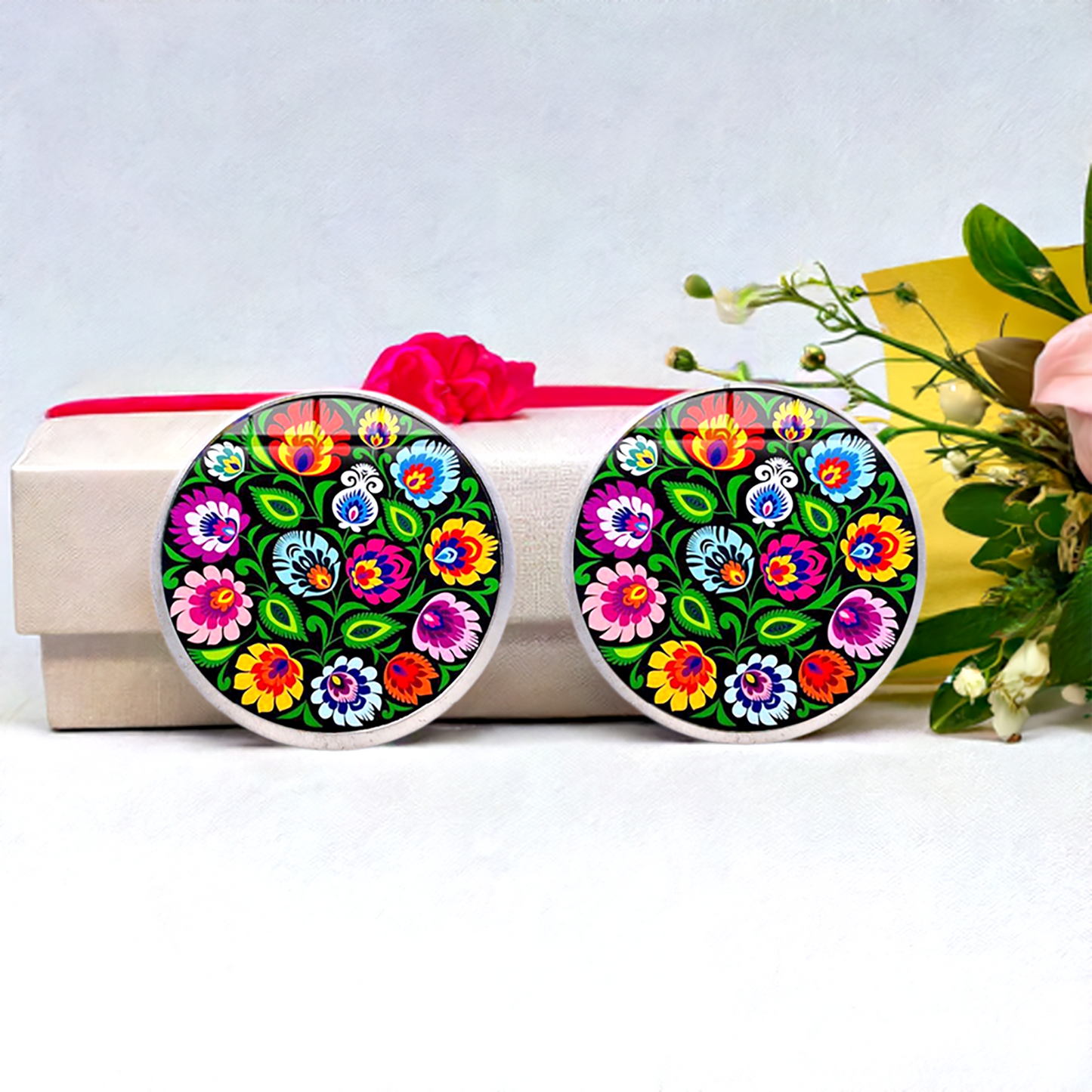 Colorful Mexican earrings with floral design. Multicolored flowers and green leaves. Silver stud earrings for women and girls.