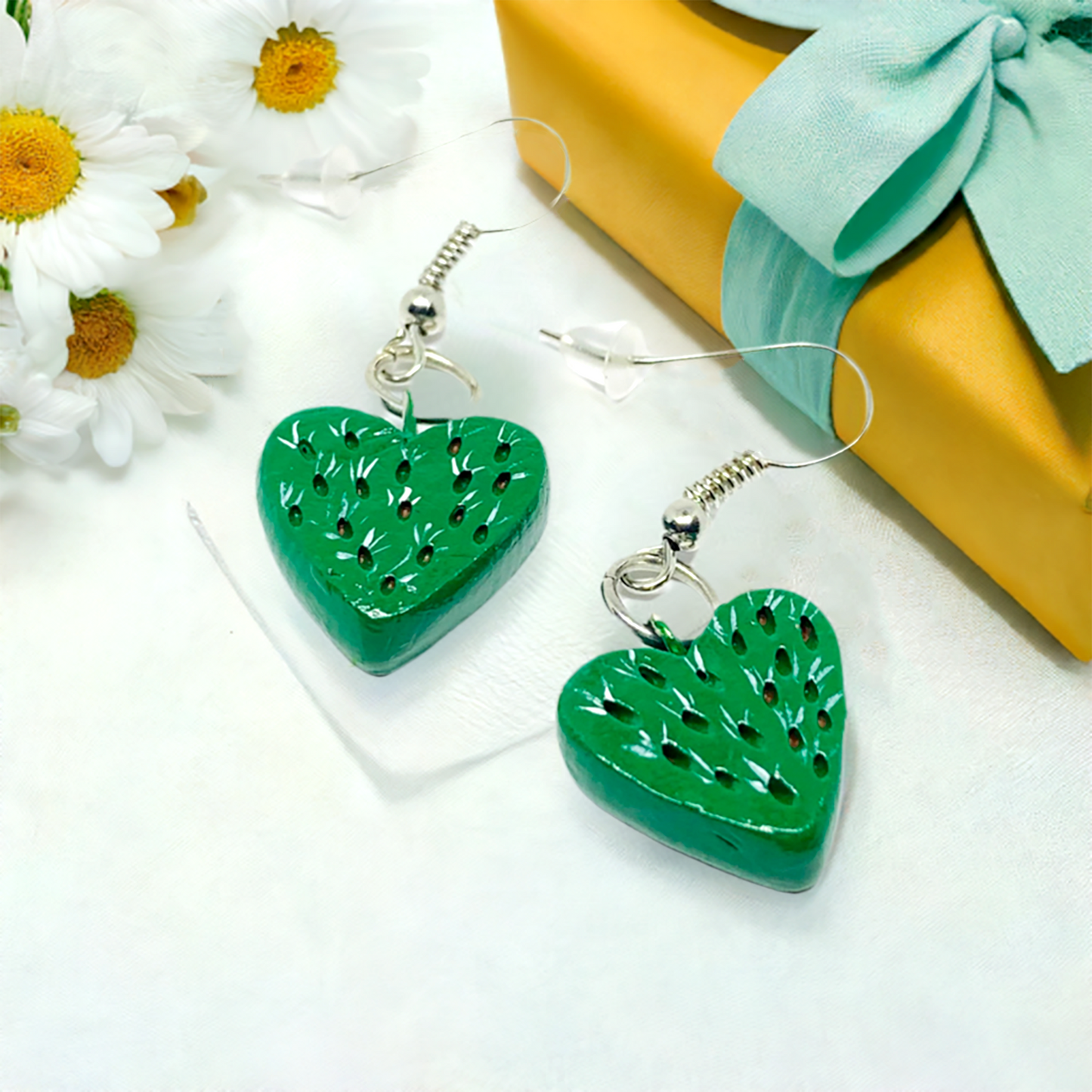 Clay cactus earrings. Handmade and handpainted clay cactus heart earrings with carved texture. Mexican earrings. Mexican clay jewelry for women and girls for Fridamaniacs and Fridalovers by Claywelry. Drop and dangle earrings. Clay food jewelry.