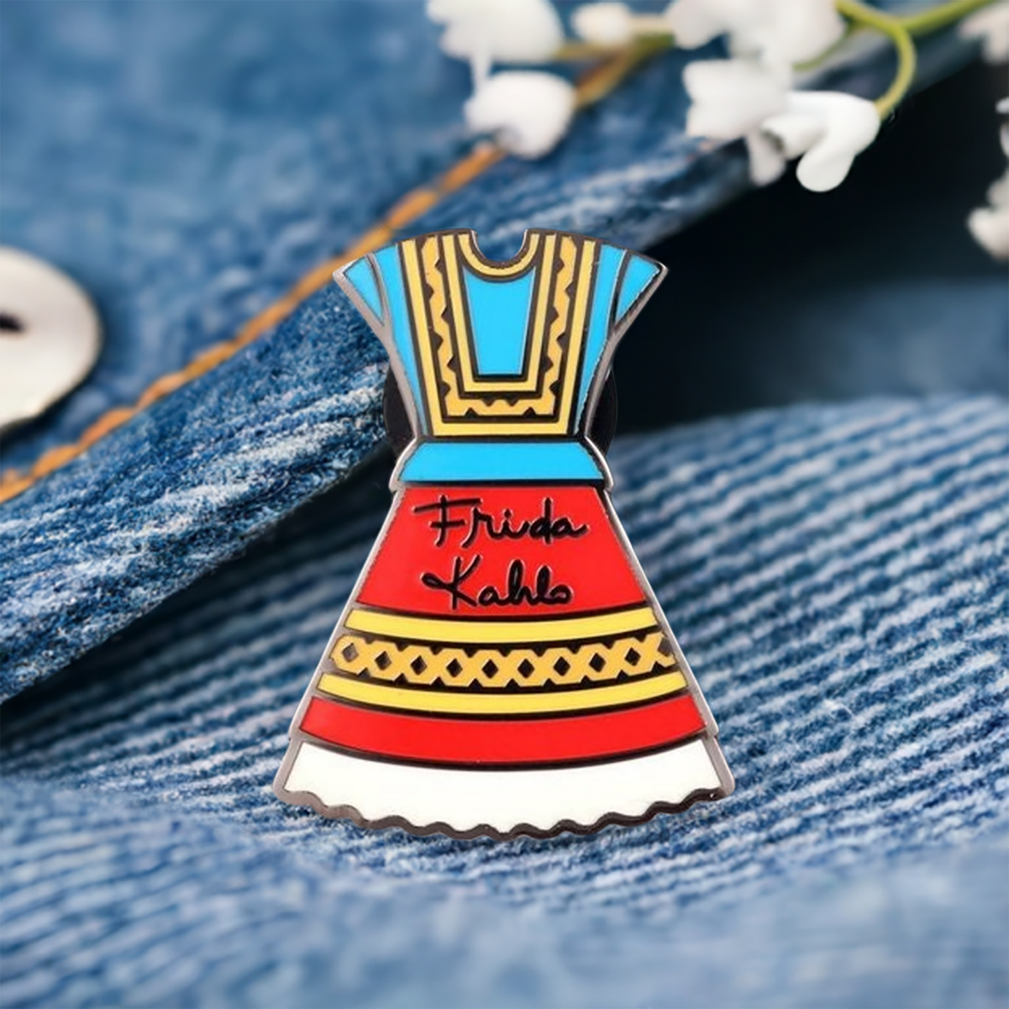 Frida Kahlo Dress Enamel Pin. Colorful red, blue, yellow, and white traditional Mexico Tehuana Oaxaca dress used by Mexican artist. With Frida Kahlo original signature on front. Cute gift idea for fridamaniacs and fridalovers.