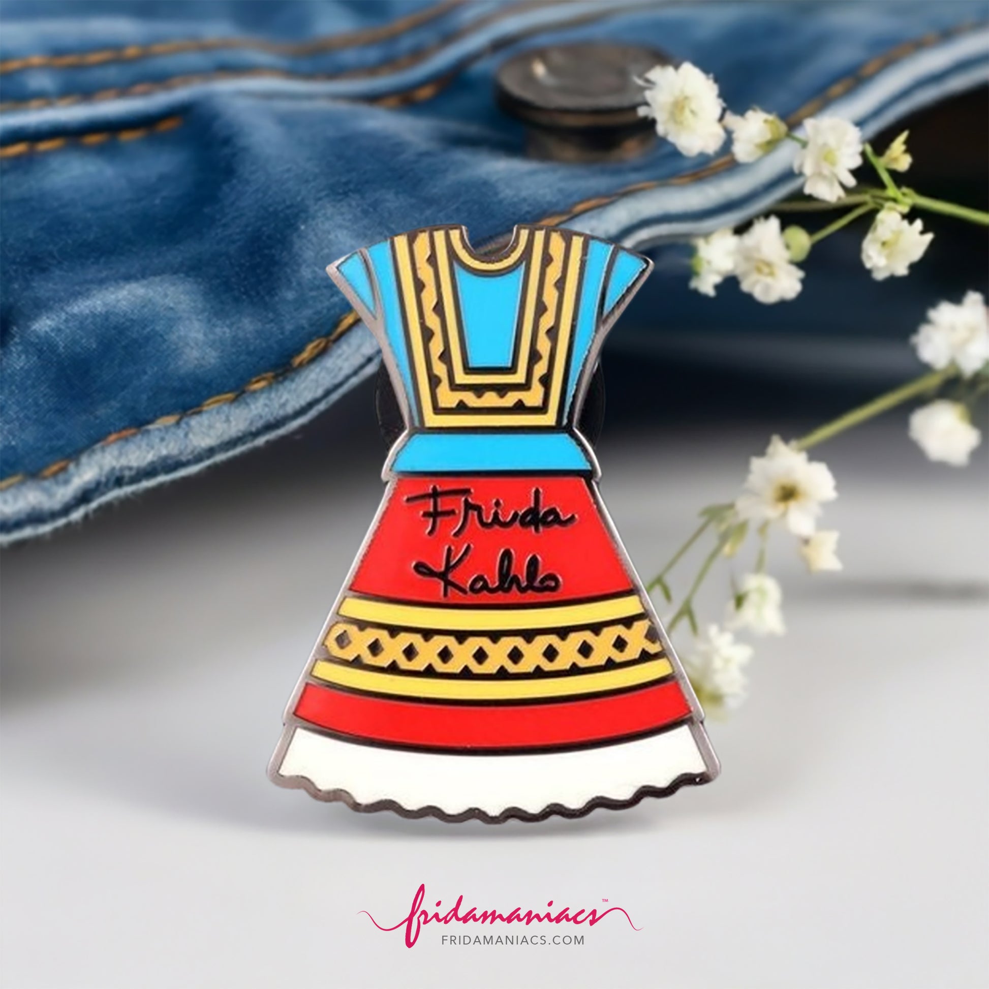 Frida Kahlo Dress Enamel Pin. Colorful red, blue, yellow, and white traditional Mexico Tehuana Oaxaca dress used by Mexican artist. With Frida Kahlo original signature on front. Cute gift idea for fridamaniacs and fridalovers.