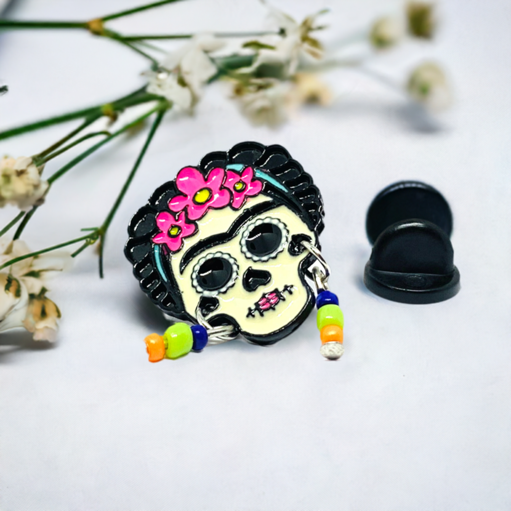 Cute Frida Kahlo enamel pin Day of the dead with beaded earrings. Cute, colorful, and original.