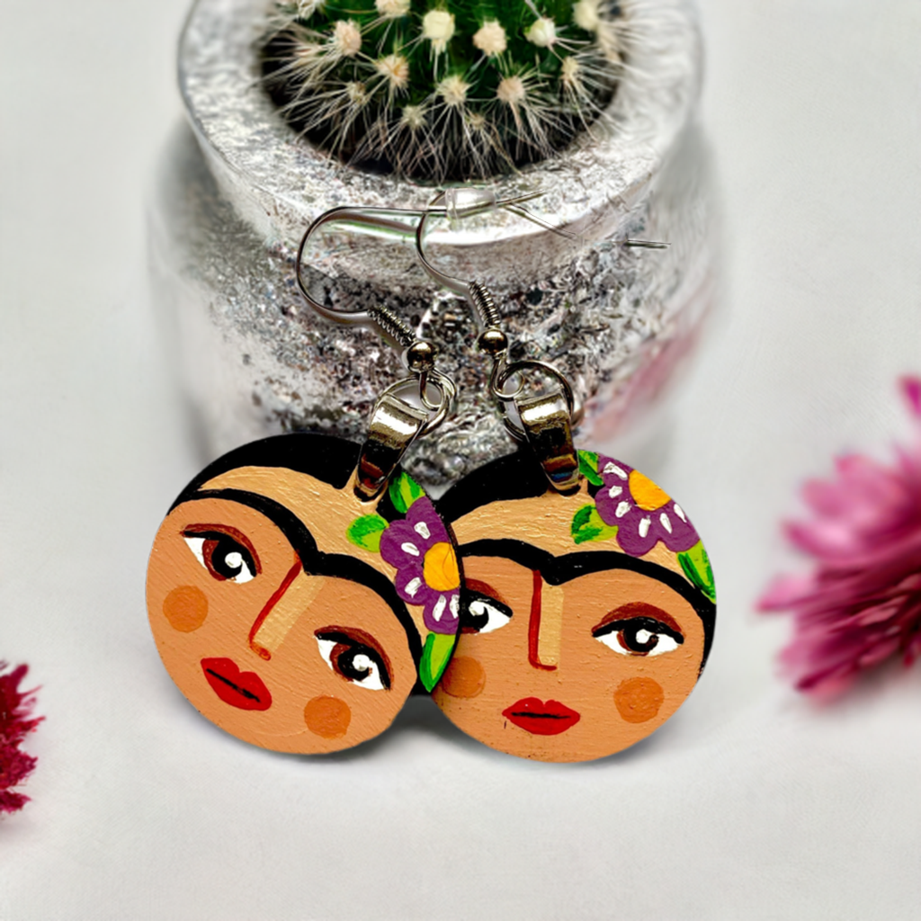 Hand painted round wooden Frida Kahlo inspired earrings. Mexican earrings by Fridamaniacs. Mexican jewelry for girls. Cute original gift idea. Colorful circular earrings painted by hand for Fridaloers