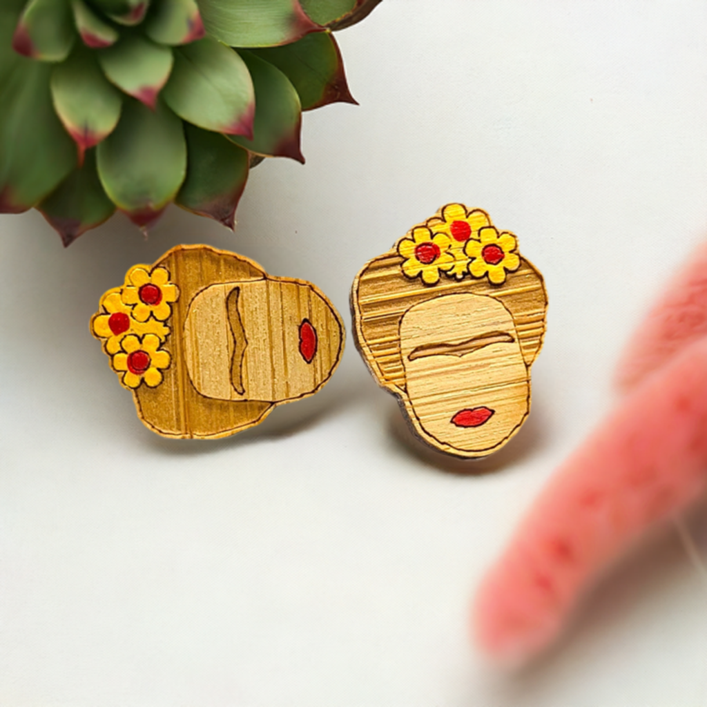 Hand painted bamboo wood Frida Kahlo earrings for girls with red lips and yellow flowers. Laser cut wood by Fridamaniacs. Fridamania. Fridalovers. Mexicaniacs. Mexican earrings. Mexican jewelry. Cute gift idea for young girls