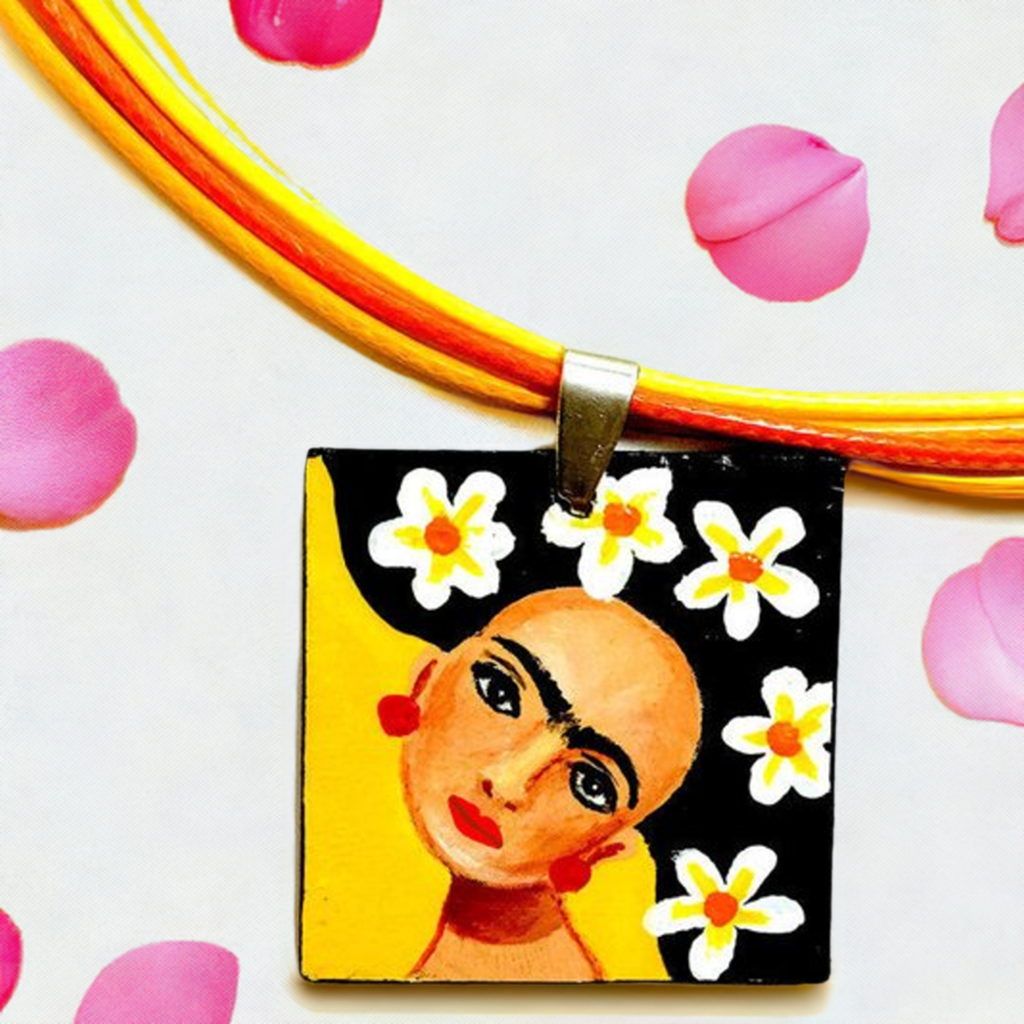 Vivid yellow hand painted Frida kahlo inspired square pendant with multicolored orange tones cords necklace. The painitng shows Frida Kahlo inspired face with iconic eyebrows and flowers. Fridamaniacs, fridalovers, and frida fans gift idea. Girl Mexican jewelry and necklace