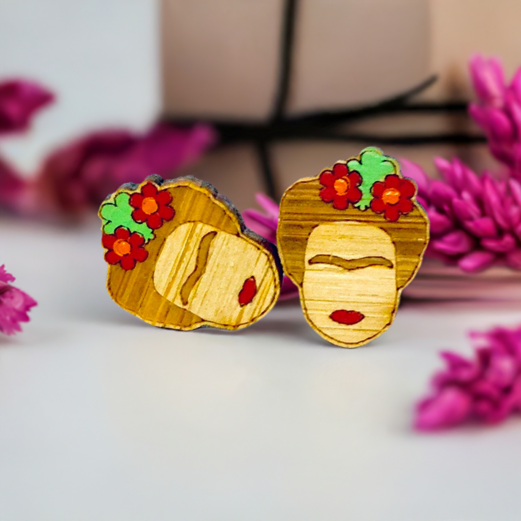 Floral Mini Bamboo Frida Kahlo inspired handpainted bamboo stud earrings with red flowers, green leaves, iconic eyebrows, and red lips for fridamaniacs, fridalovers, fridamania, frida fans girls. Cool gift idea. Mexican earrings. Mexican jewelry. Cute and original women jewelry accessories.