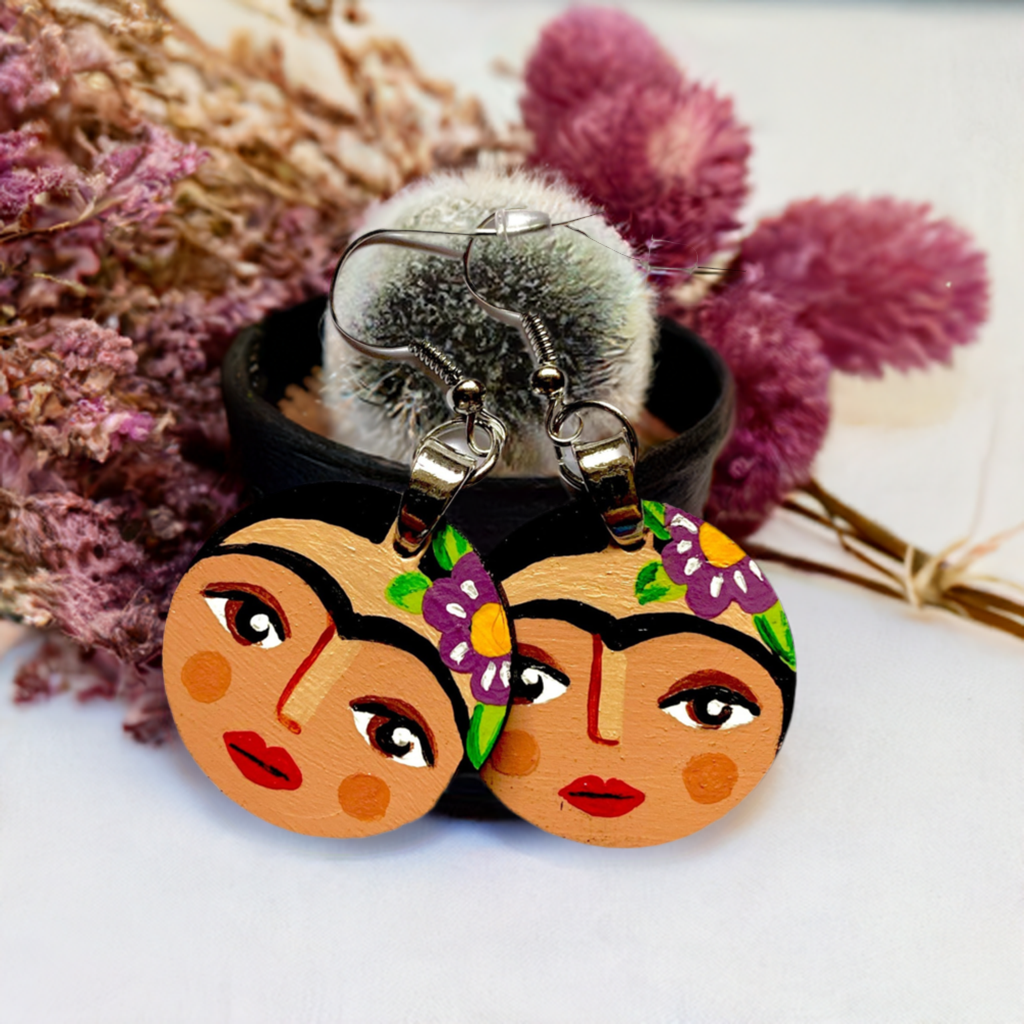 Hand painted round wooden Frida Kahlo inspired earrings. Mexican earrings by Fridamaniacs. Mexican jewelry for girls. Cute original gift idea. Colorful circular earrings painted by hand for Fridaloers