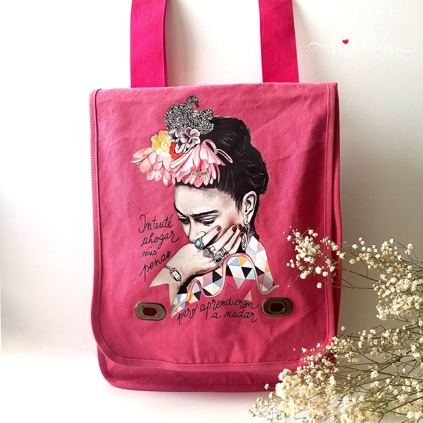 Trendy Frida Kahlo pink soft cotton canvas shoulder or crossbody bag with adjustable strap. Cute, colorful, original fashion accessory for women and girls. Frida floral illustration and famous artist quote.