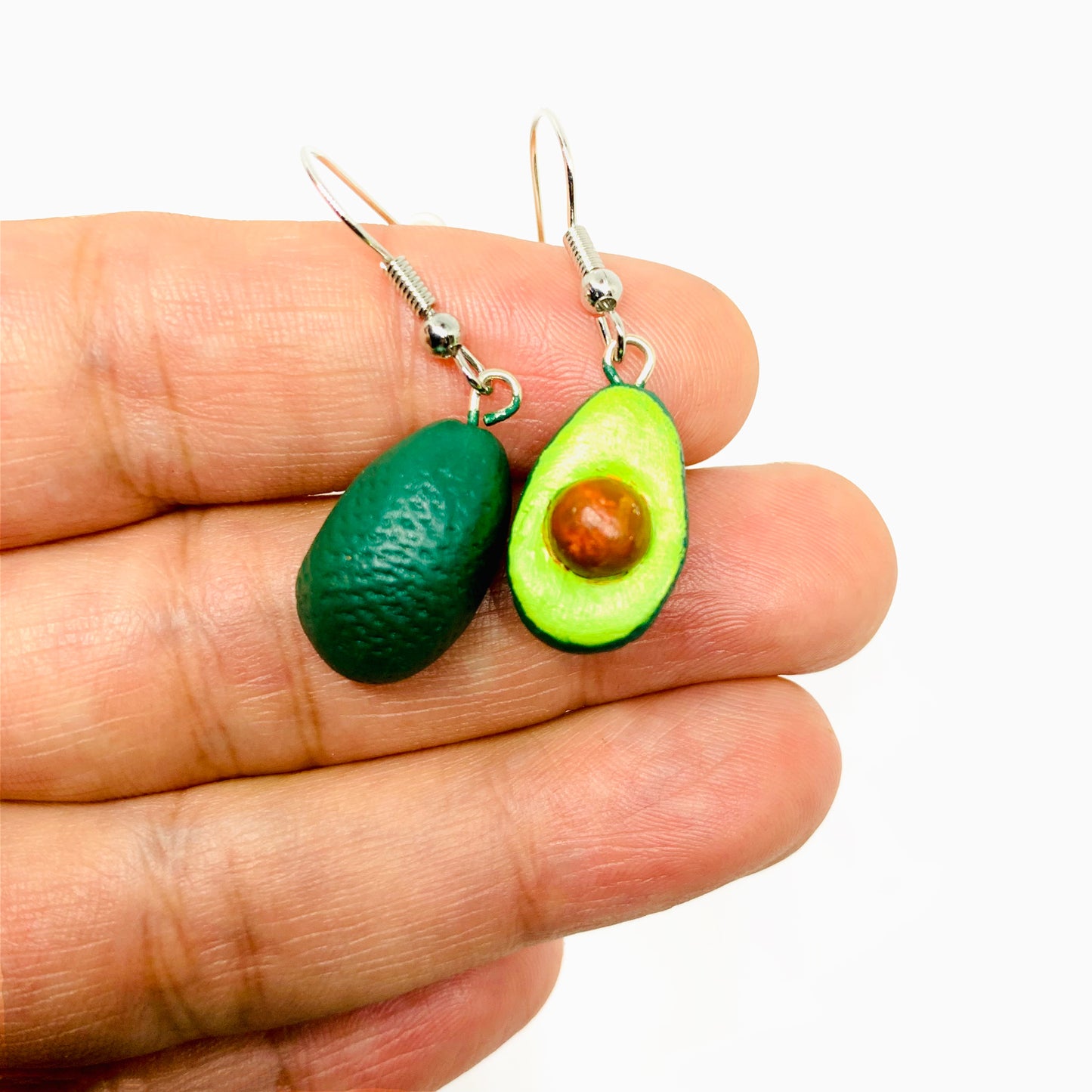 Avocado Earrings: Handmade and hand painted natural clay avocado drop and dangle earrings for girls. Mexican jewelry. Mexico folk art. Food jewelry inspired by Frida Kahlo by Fridamaniacs and Fridalovers. Women and girls gift birthday idea. Aretes de agucate hechos de barro y pintados a mano