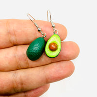 Avocado Earrings made of natural clay and hand painted. Drop and dangle. Mexican jewelry food. Mexico folk art to wear. Aretes de aguacate pintados a mano para mujer. Fridamaniacs, Frida kahlo inspired wearable art and accessories